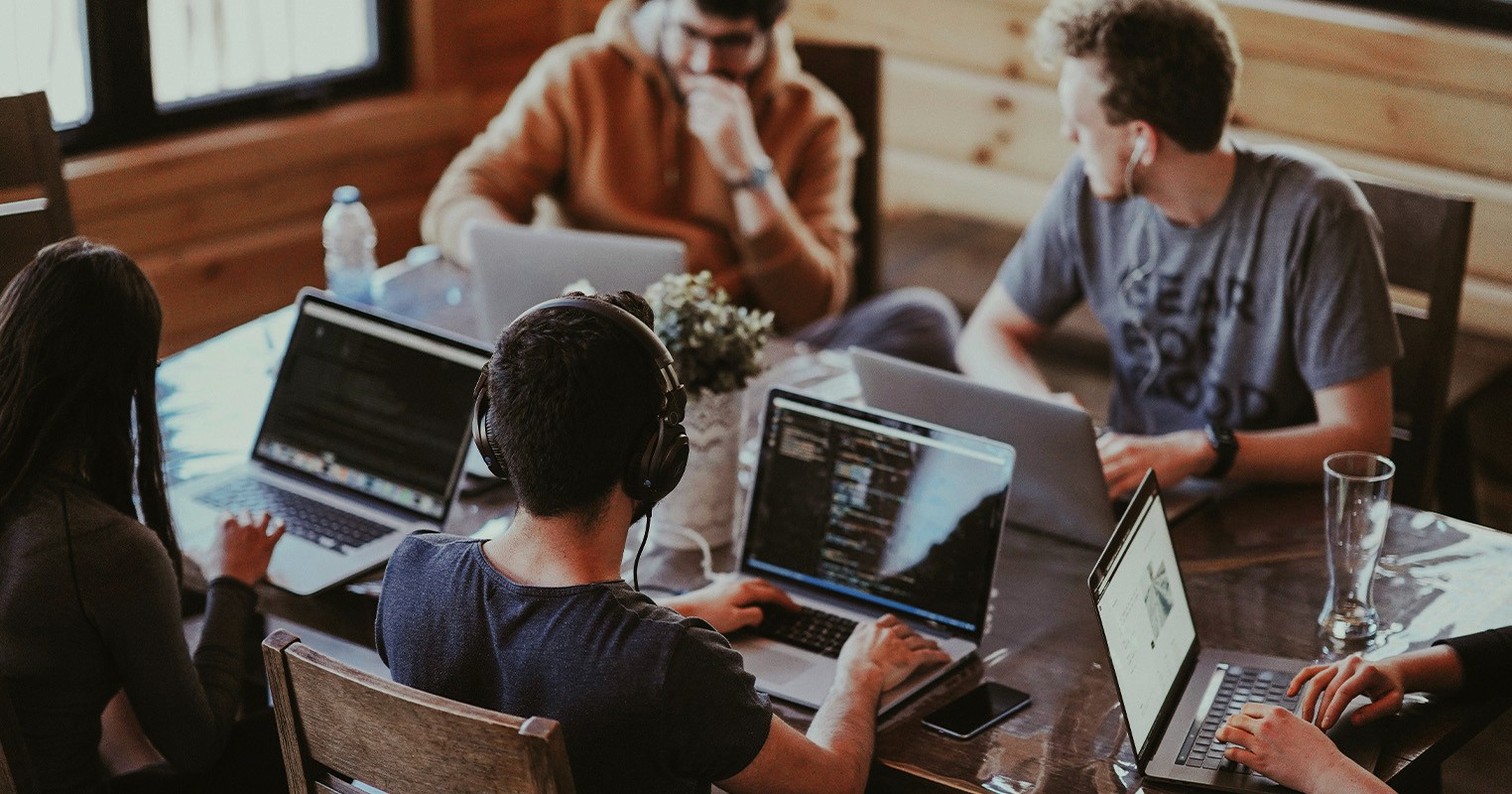 Colleagues in a meeting all chatting