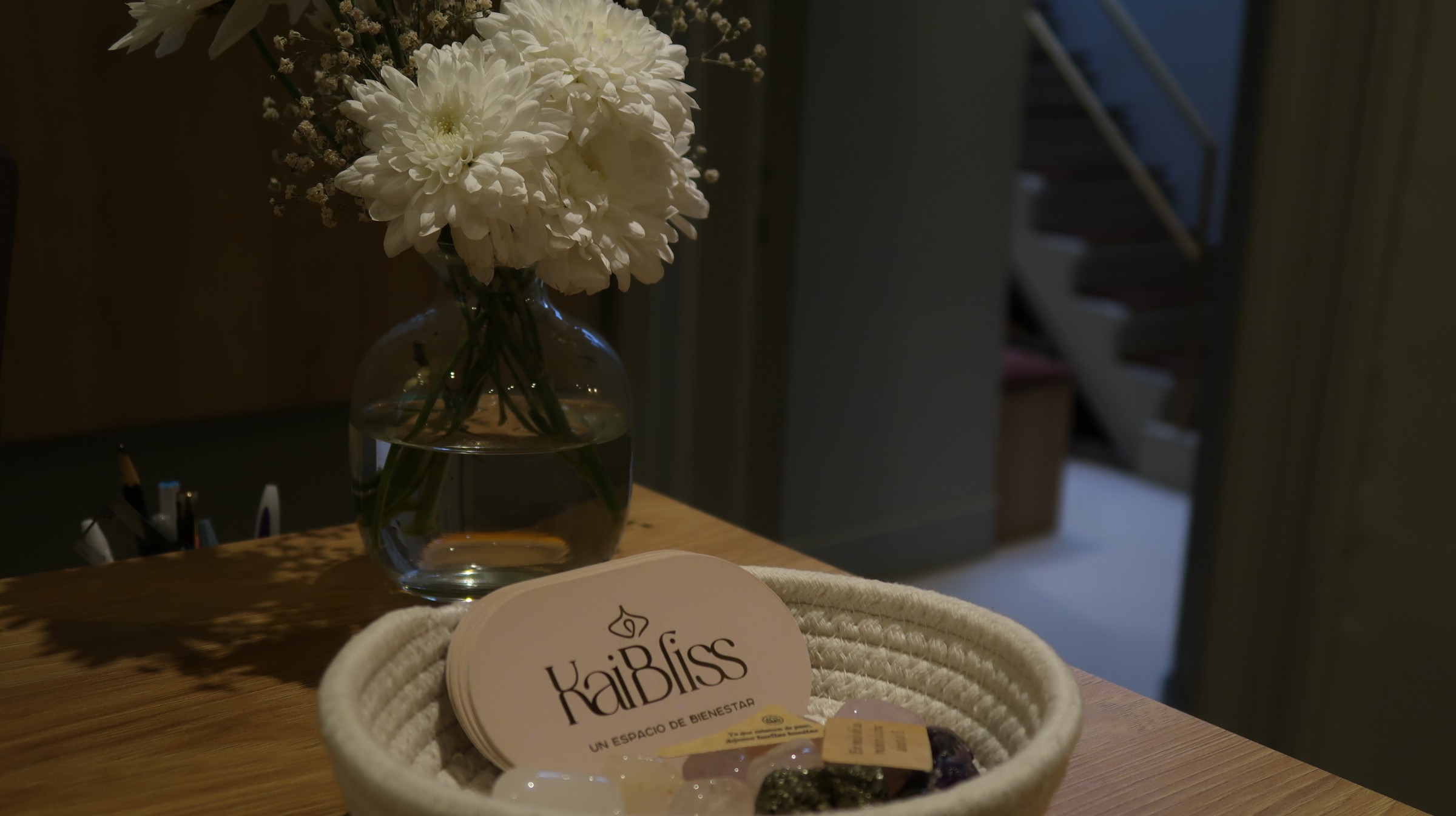 Man standing with hands in prayer position and eyes closed