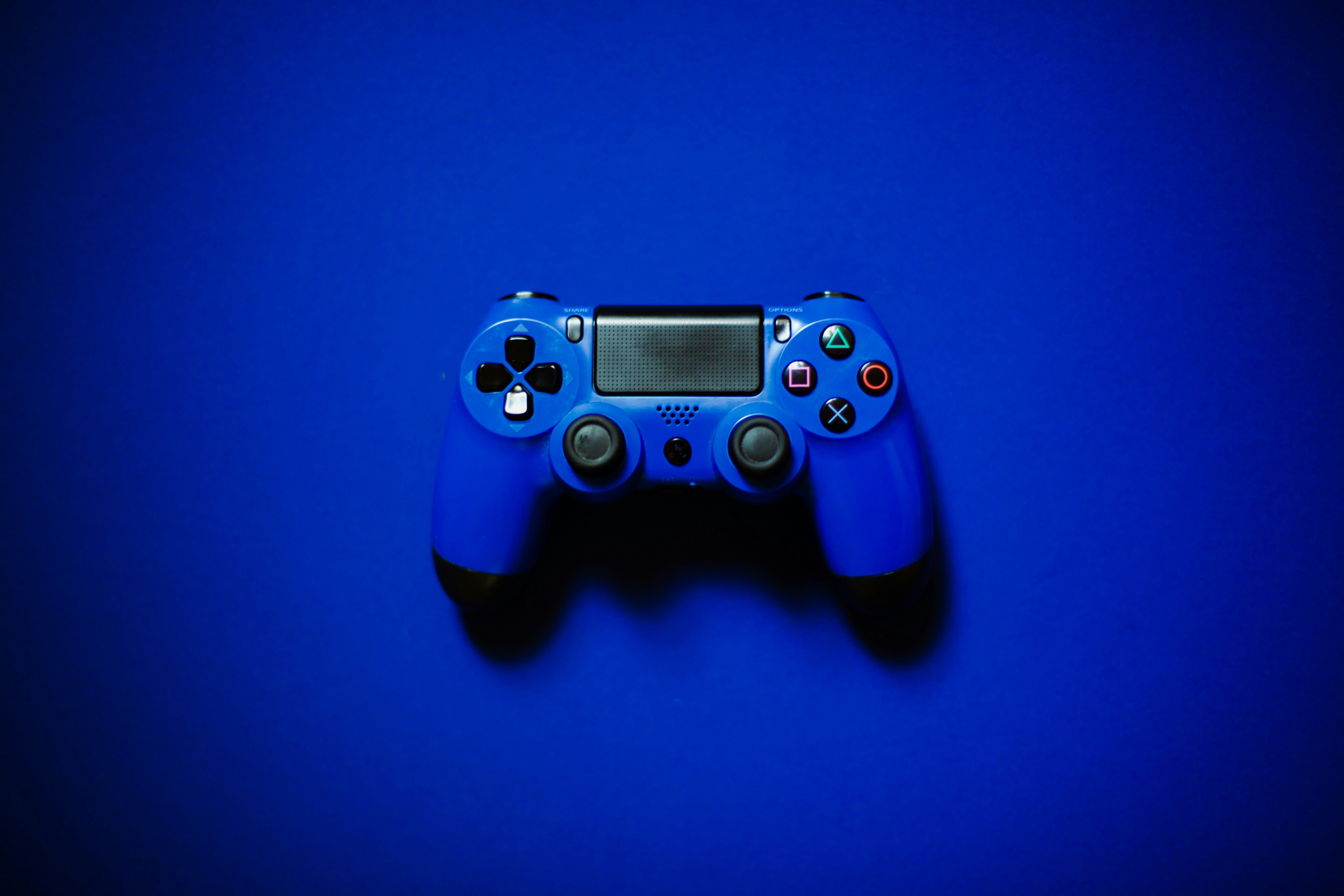 blue sony ps 4 game controller