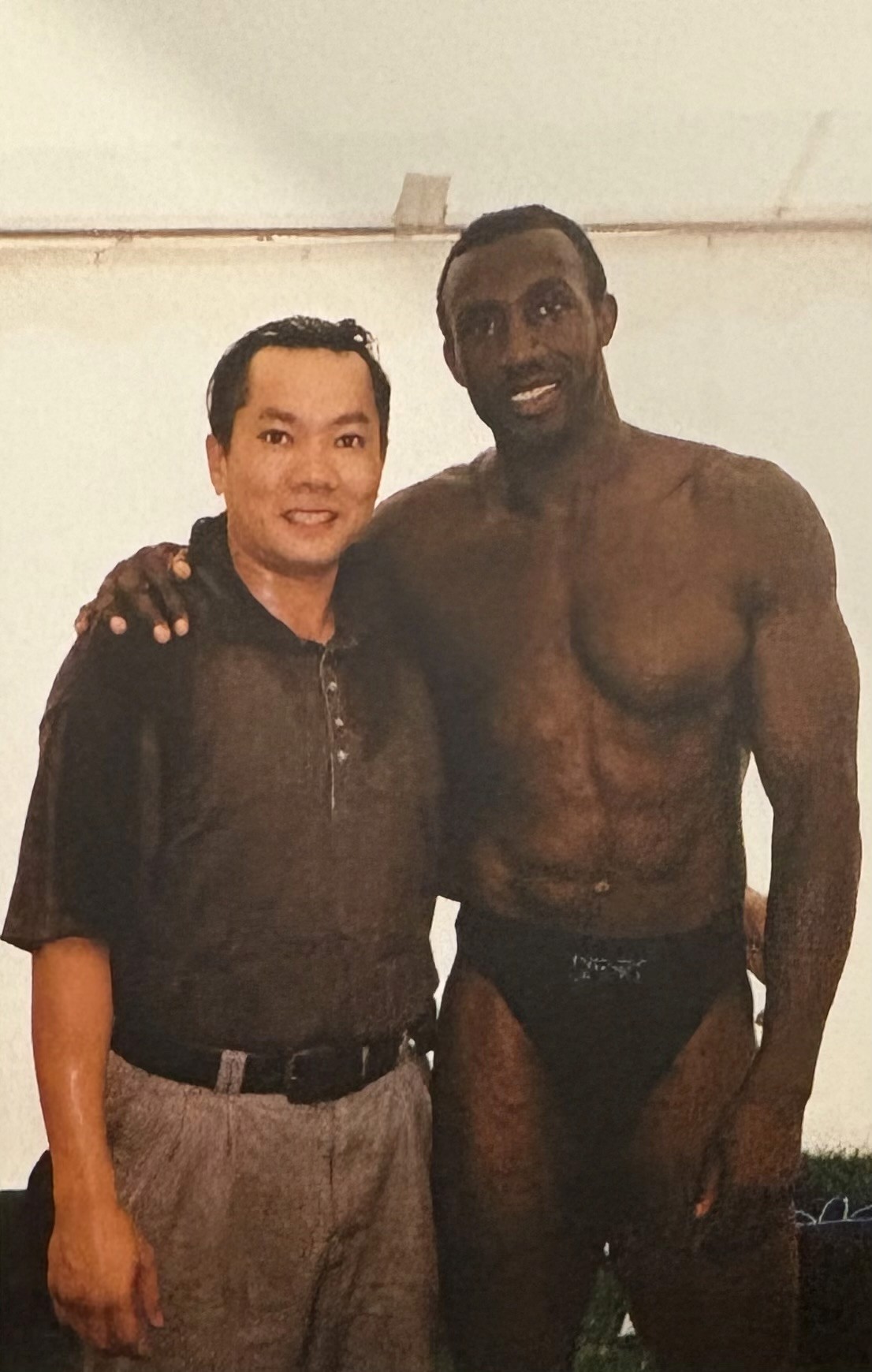 Longy Nguyen with Olympian Linford Christie