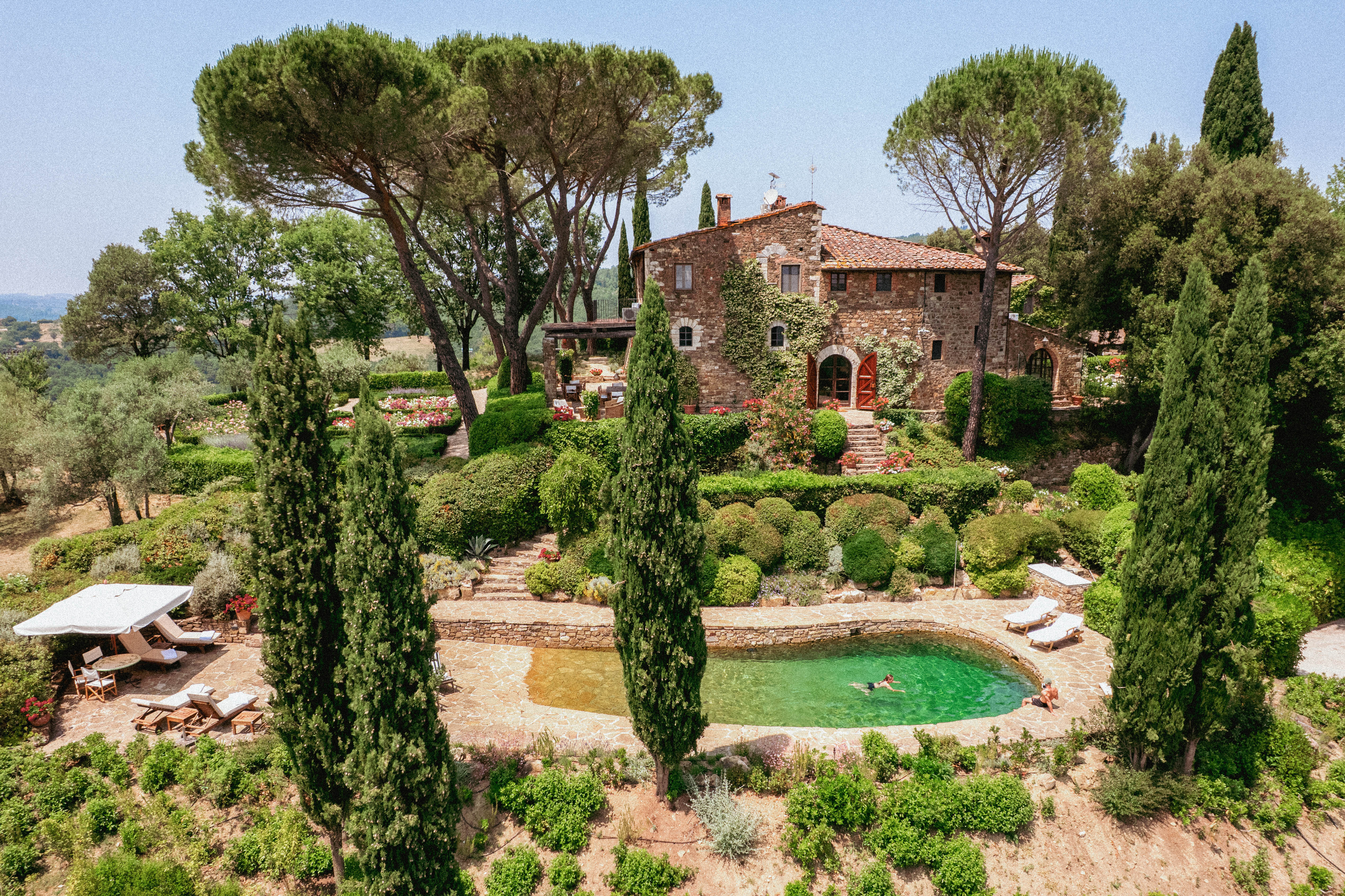 Stone villa rooftop overlooking the Tuscan valley