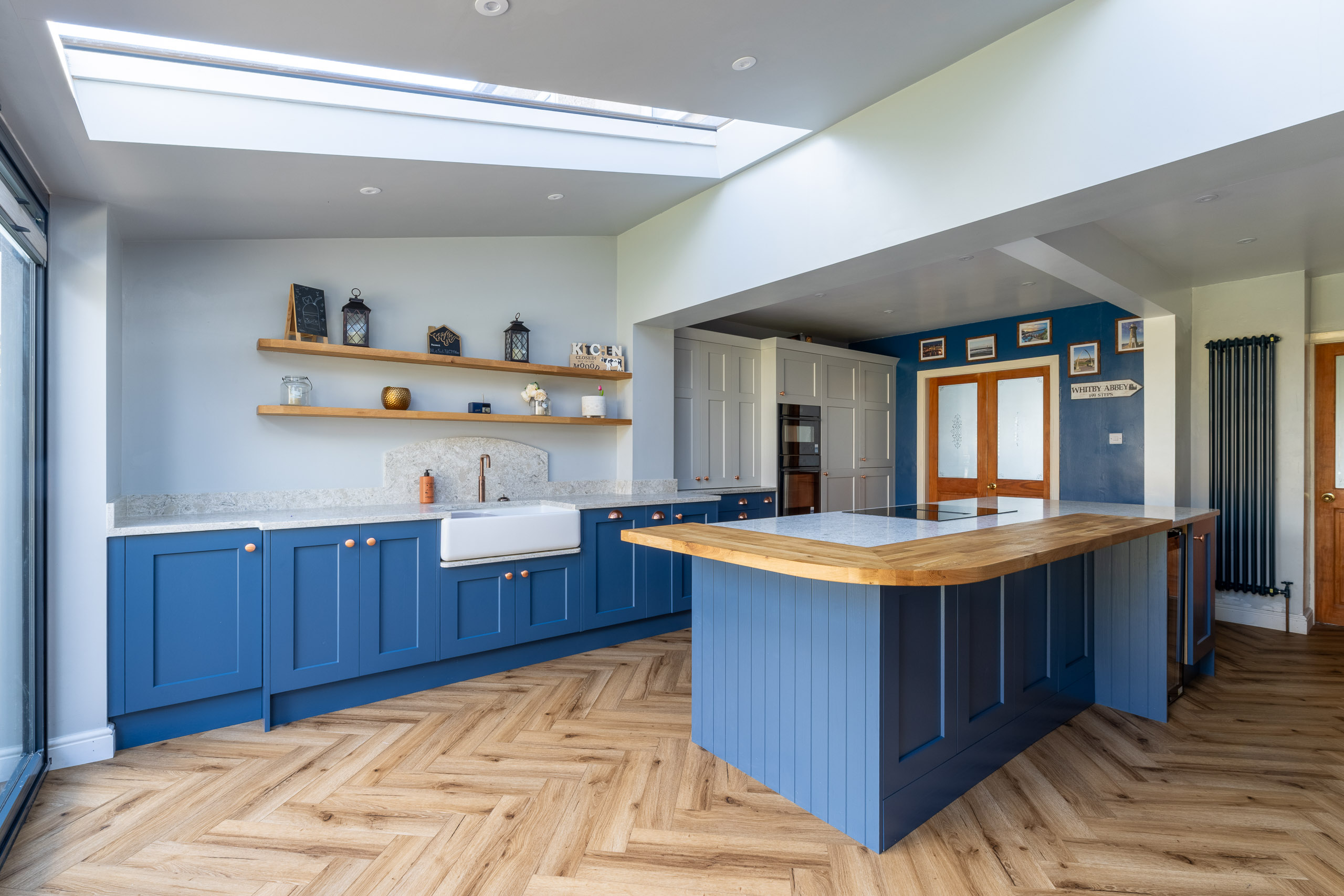 blue shaker kitchen with oak breakfast bar in gomersal, cleckheaton