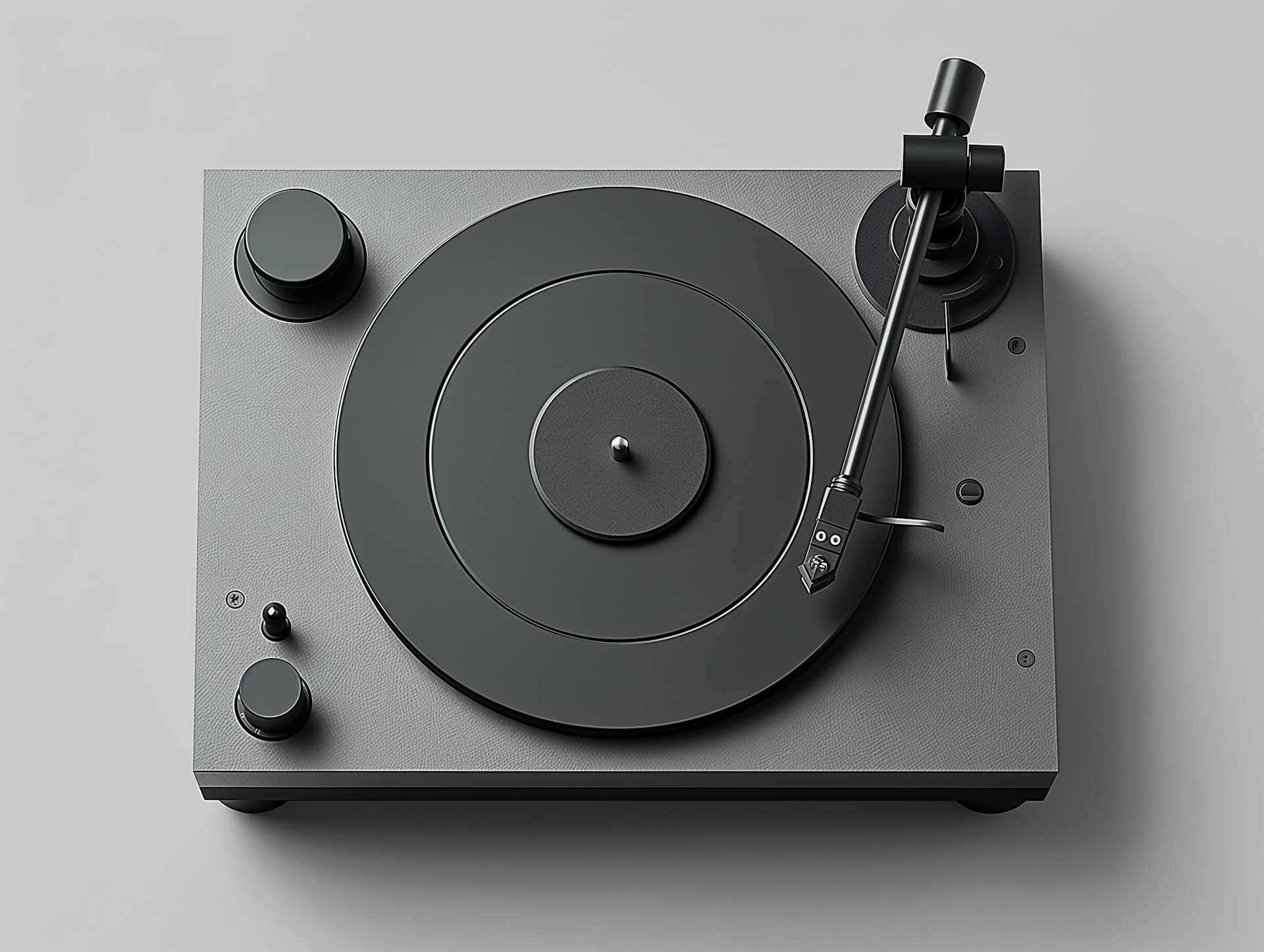  A turntable featuring a sleek black and gray surface, showcasing its modern design and functionality.