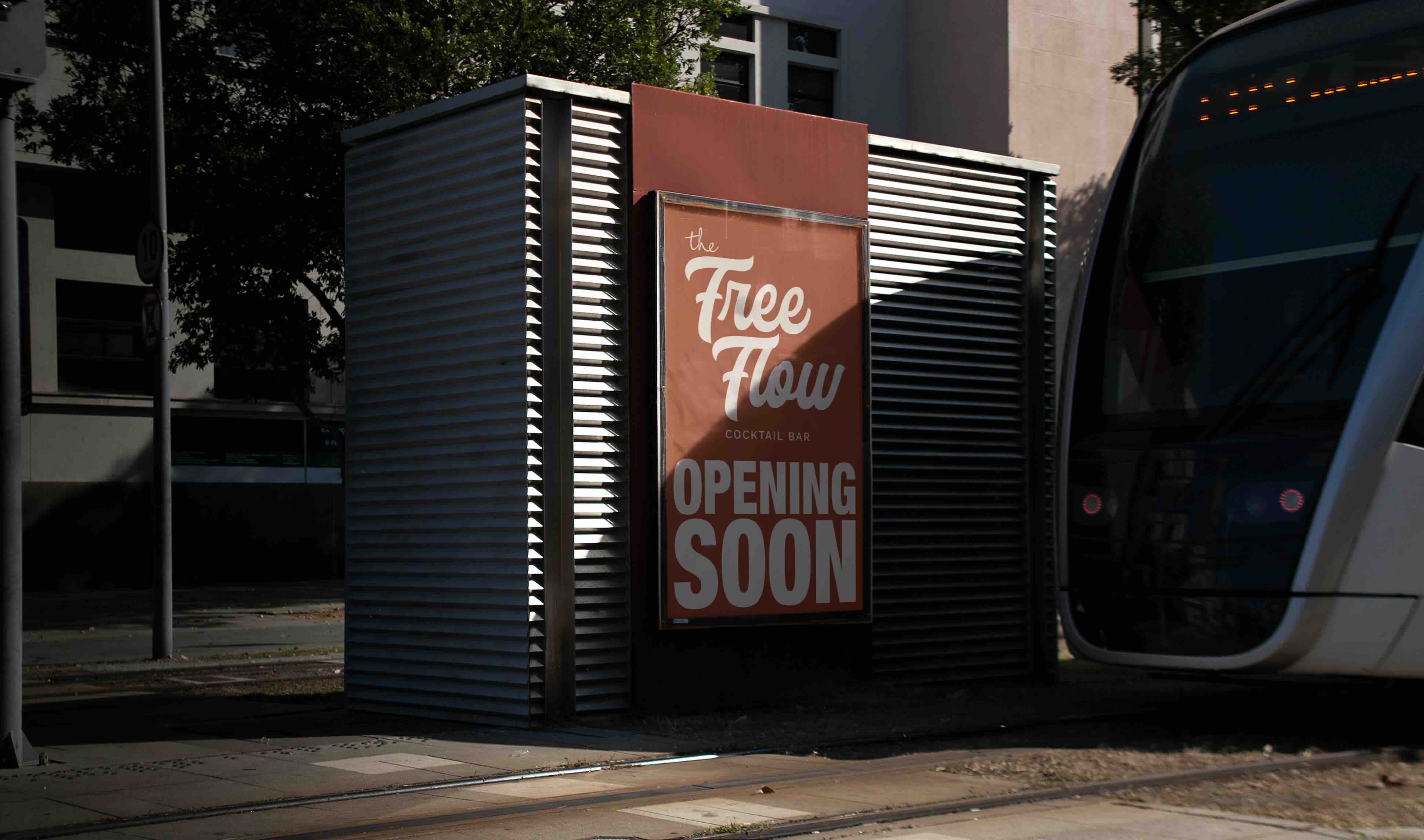 Branded out of home signage for The Free Flow cocktail bar