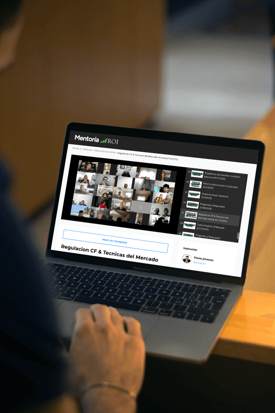 macbook pro on brown wooden table