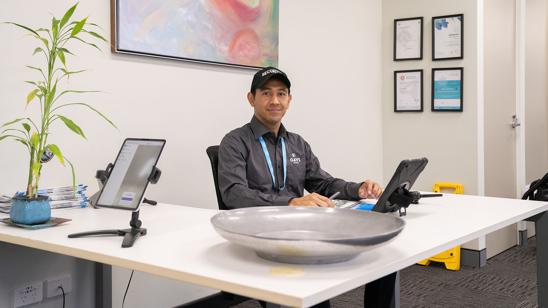 GAVS Group security member sitting at desk