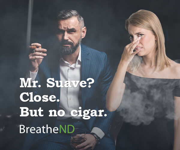 Man smoking cigar, woman pluggin her nose surrounded by smoke