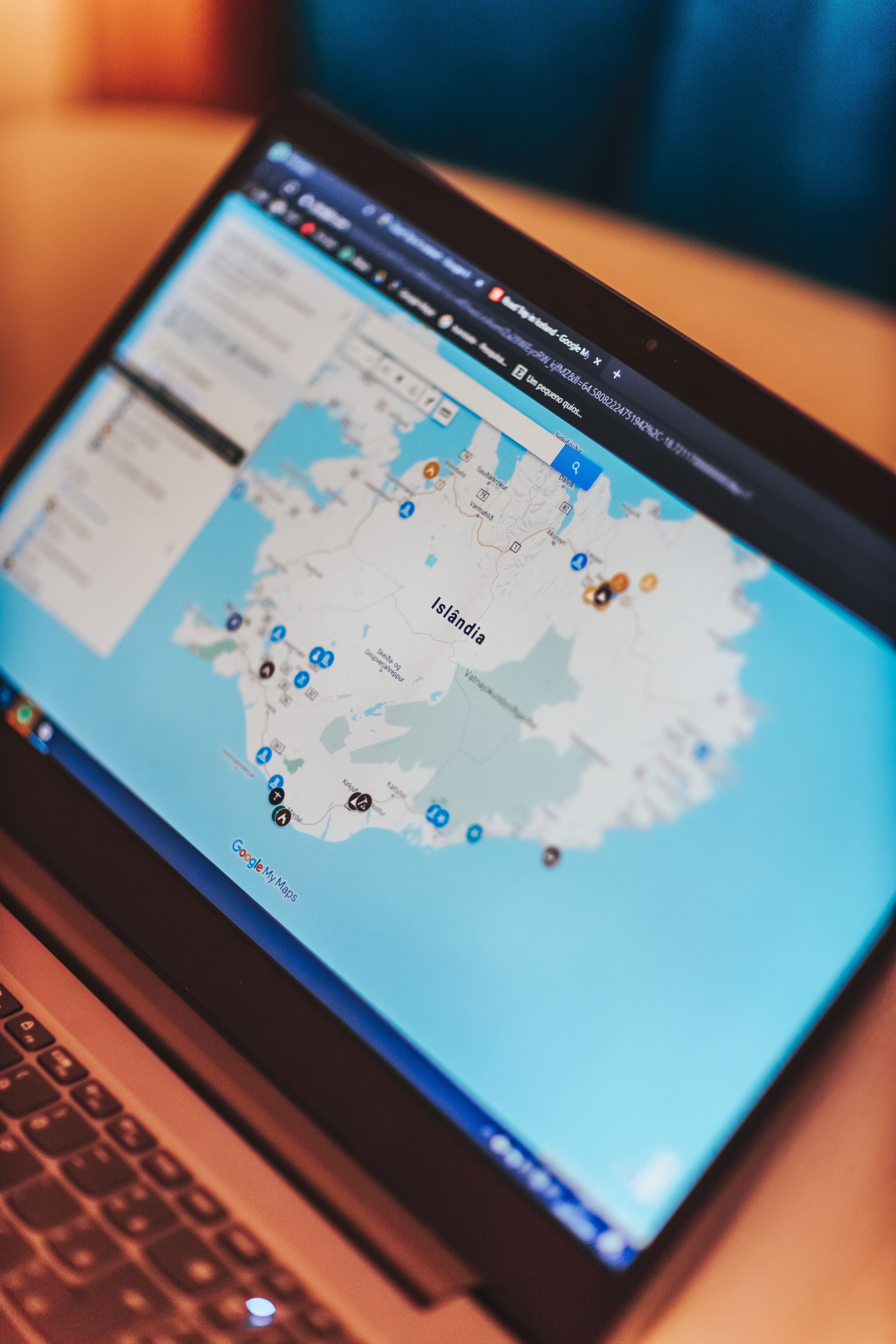 Close-up of a laptop screen displaying an interactive map, ideal for travel planning and navigation.