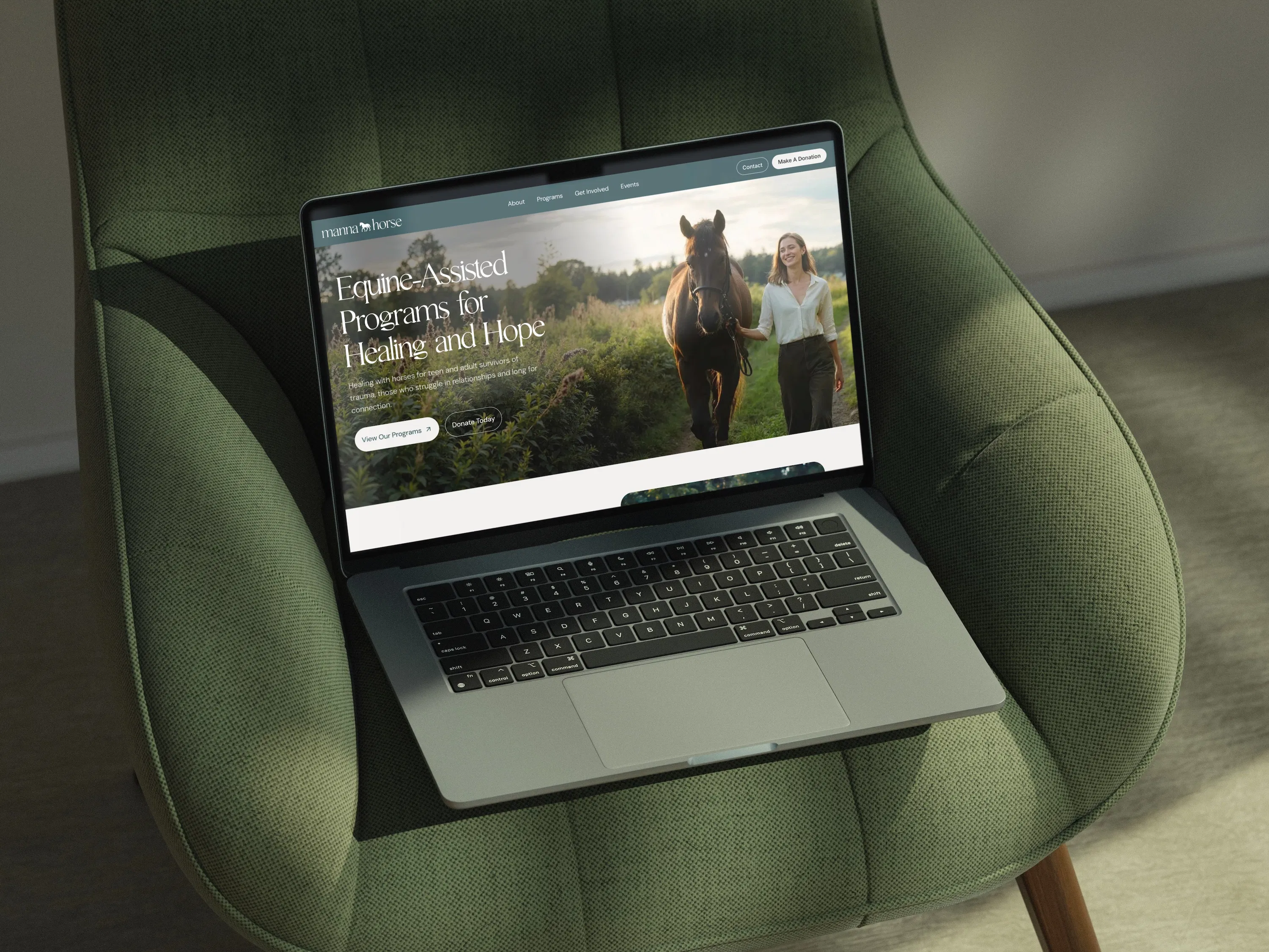 Louisiana nonprofit website displayed on a MacBook.