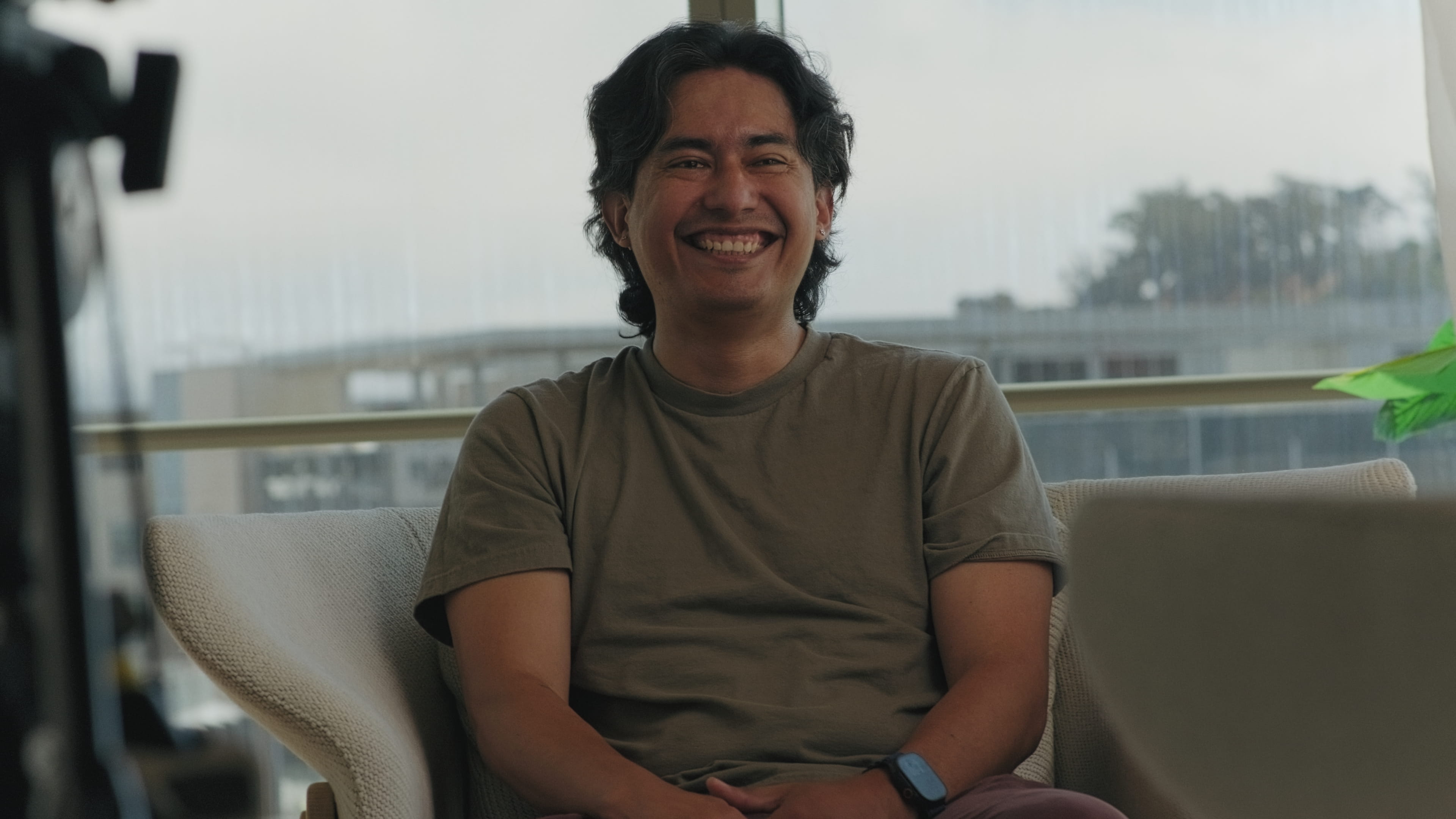 man smiling during an interview about inclusive leadership at uber