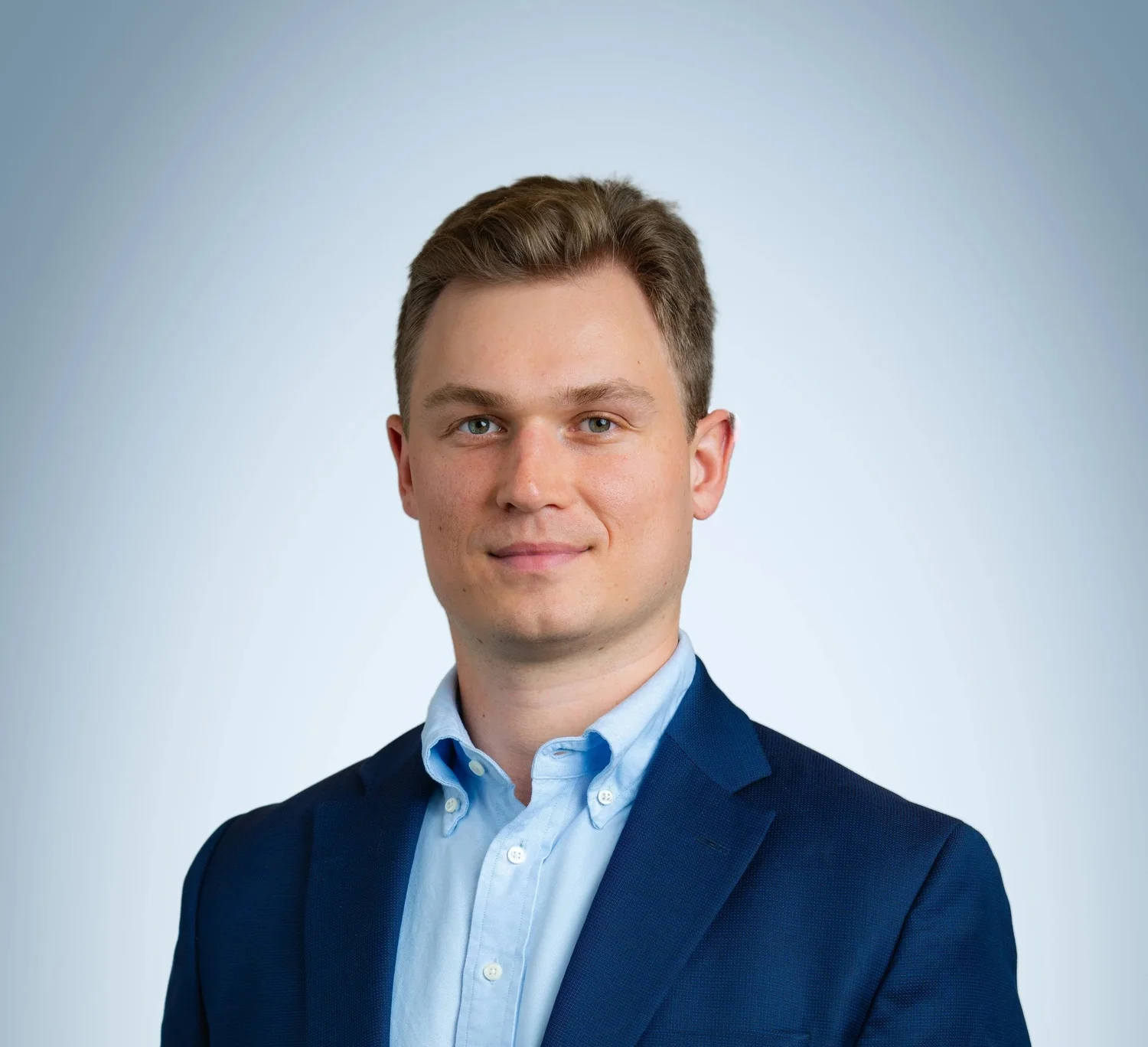 man wearing gray suit jacket