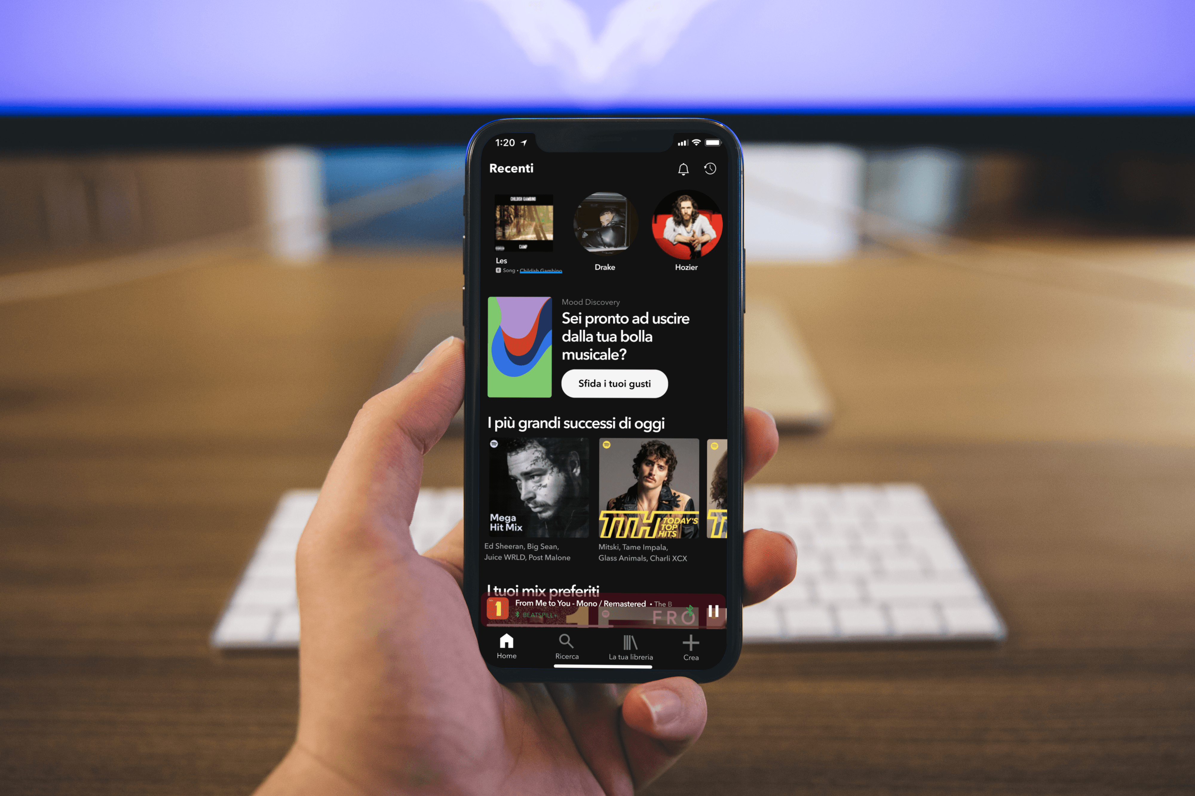 A mockup of an iPhone held in hands.
