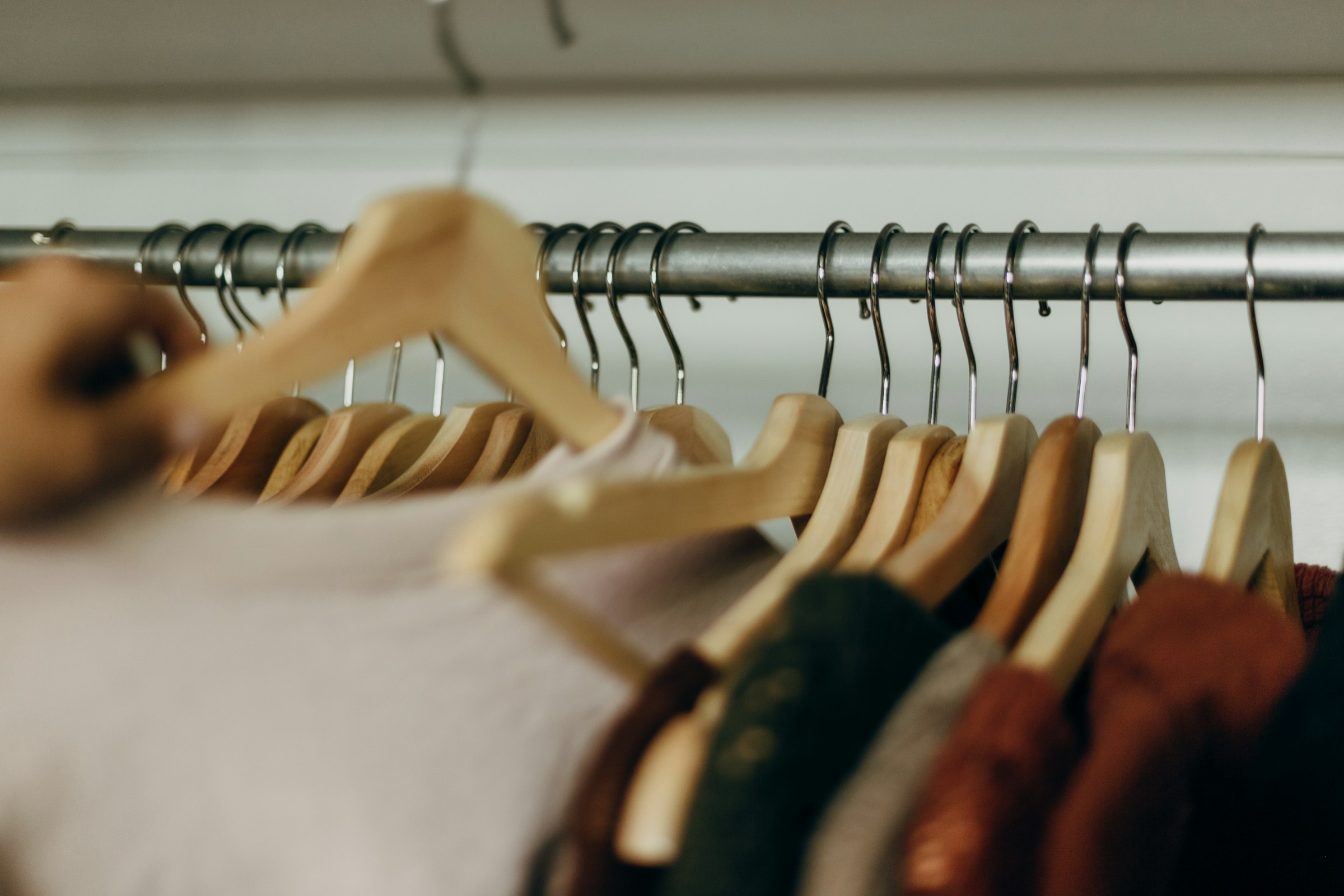 Clothes on Rack - Colors That Go with Brown Clothes