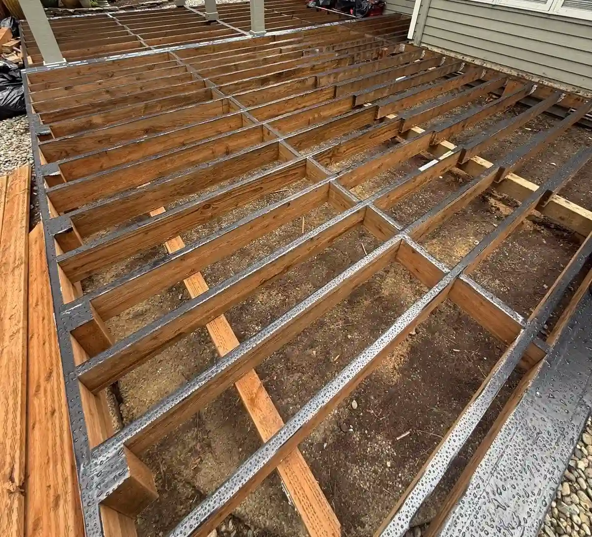 Deck waterproofing detail for preventing wood decay