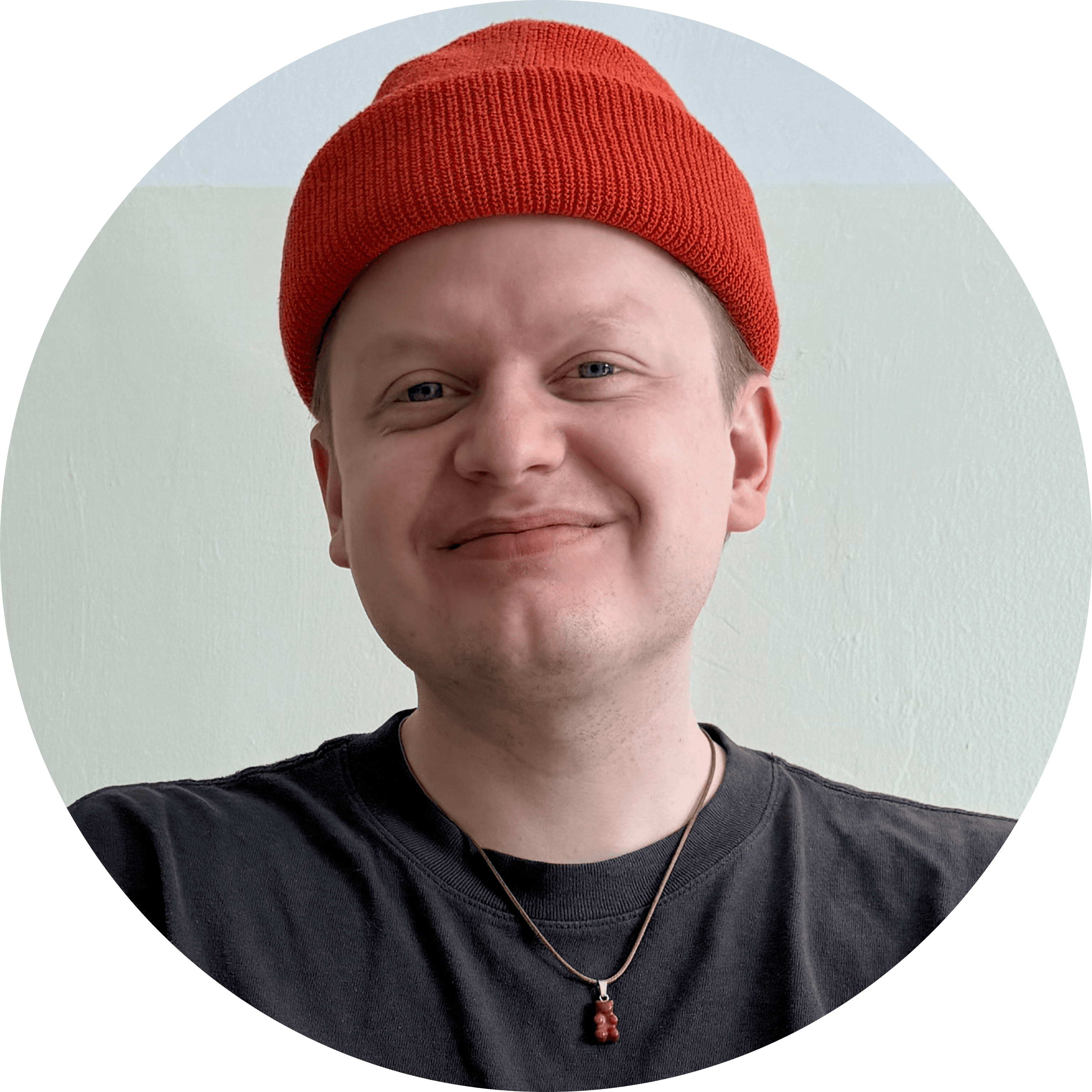 A portrait of a young man smiling