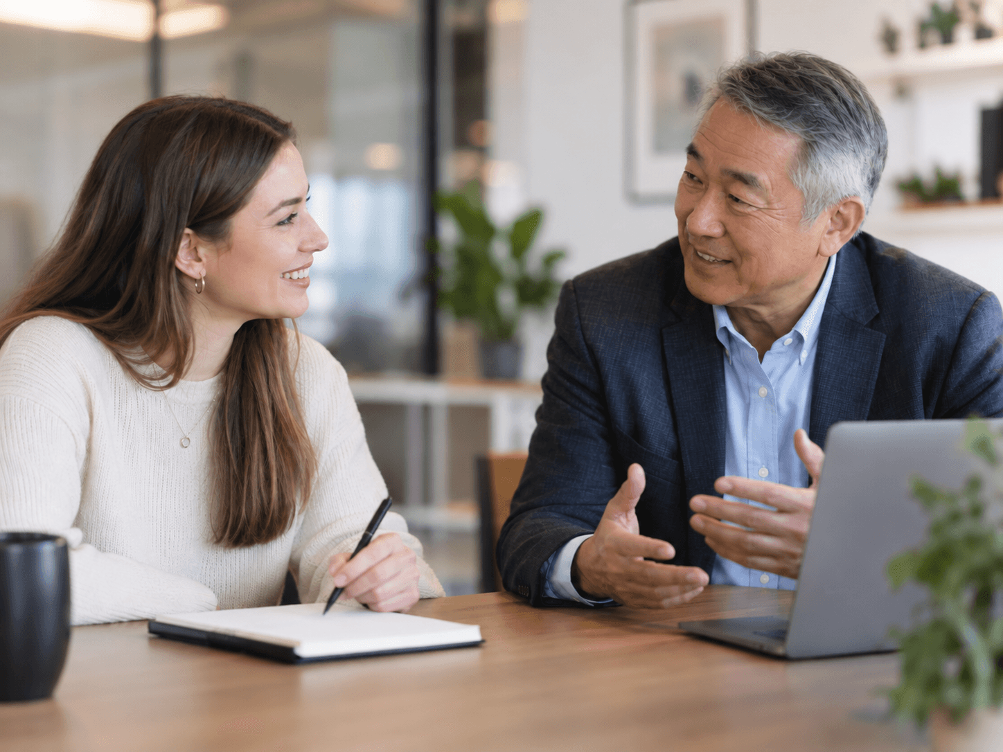 Professional coaching conversation between a leader and coach.