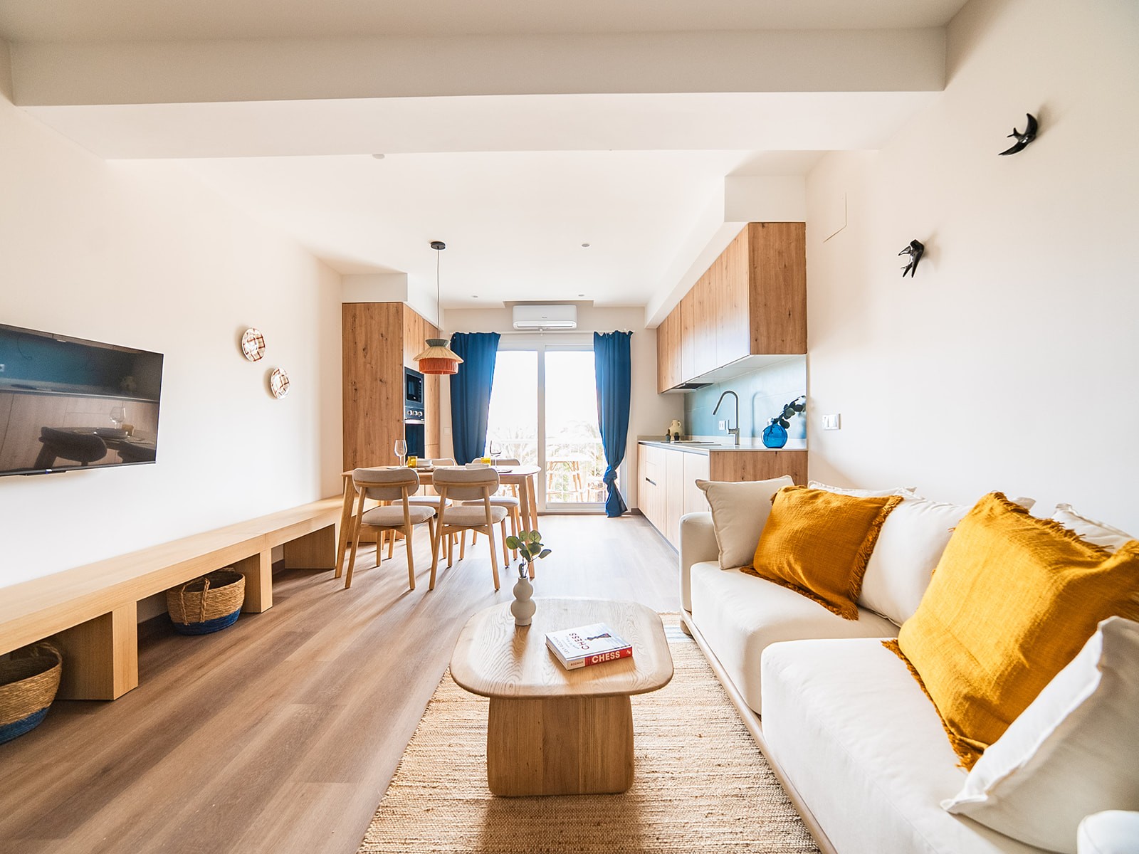 Photo of a beautiful light kitchen with big windows