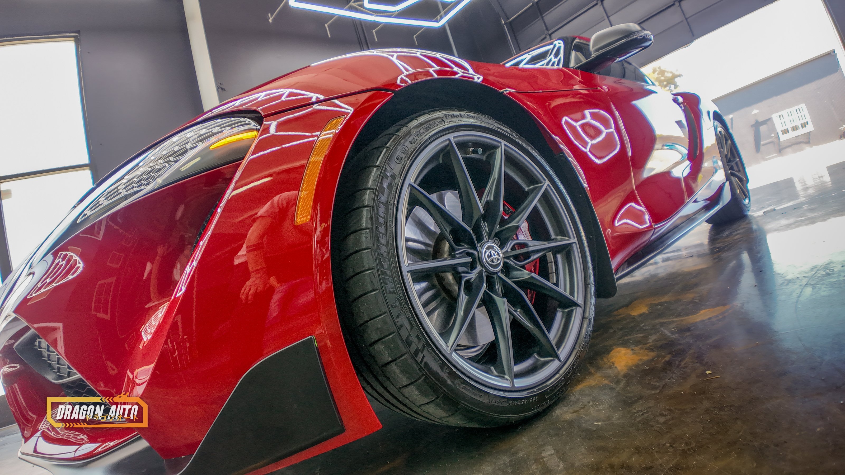 Red 2023 Toyota GR Supra with Icon Rocklear paint protection, front wheel detail, Dragon Auto Milpitas