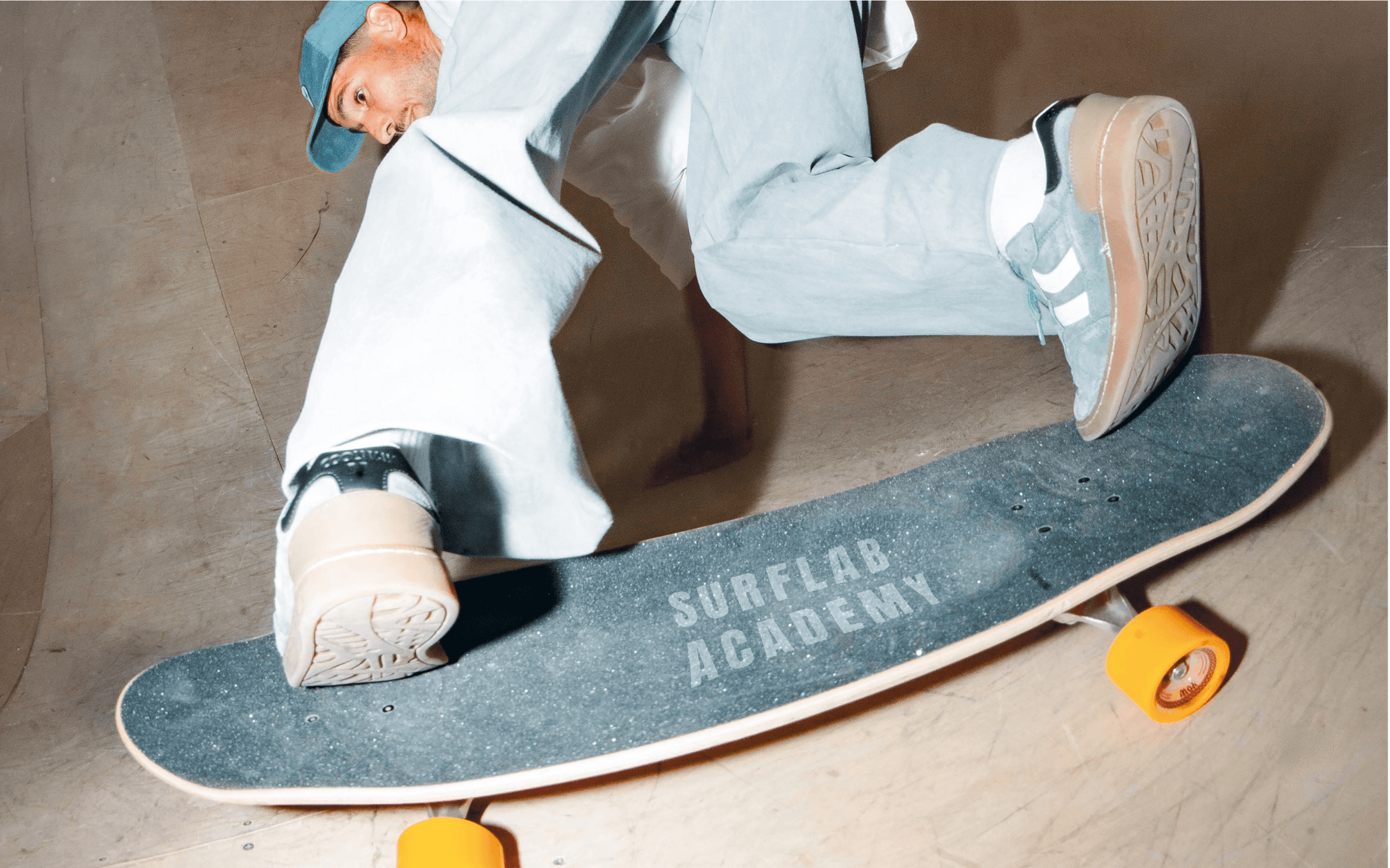 Surflab academy logo on surfskate
