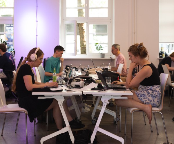 group of hackers working