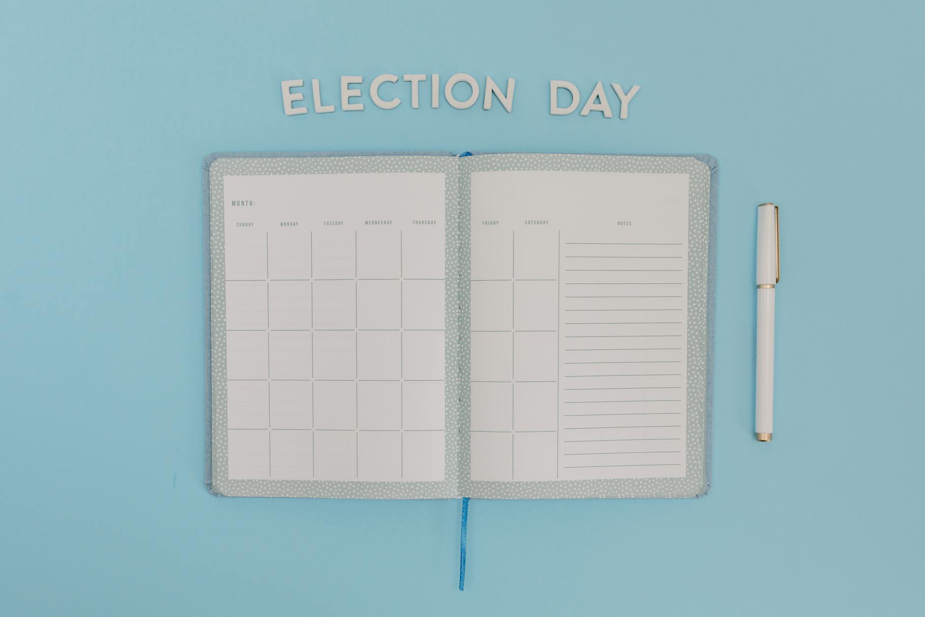 A colorful weekly planner on a desk with handwritten notes and checkboxes for a daily self care routine.