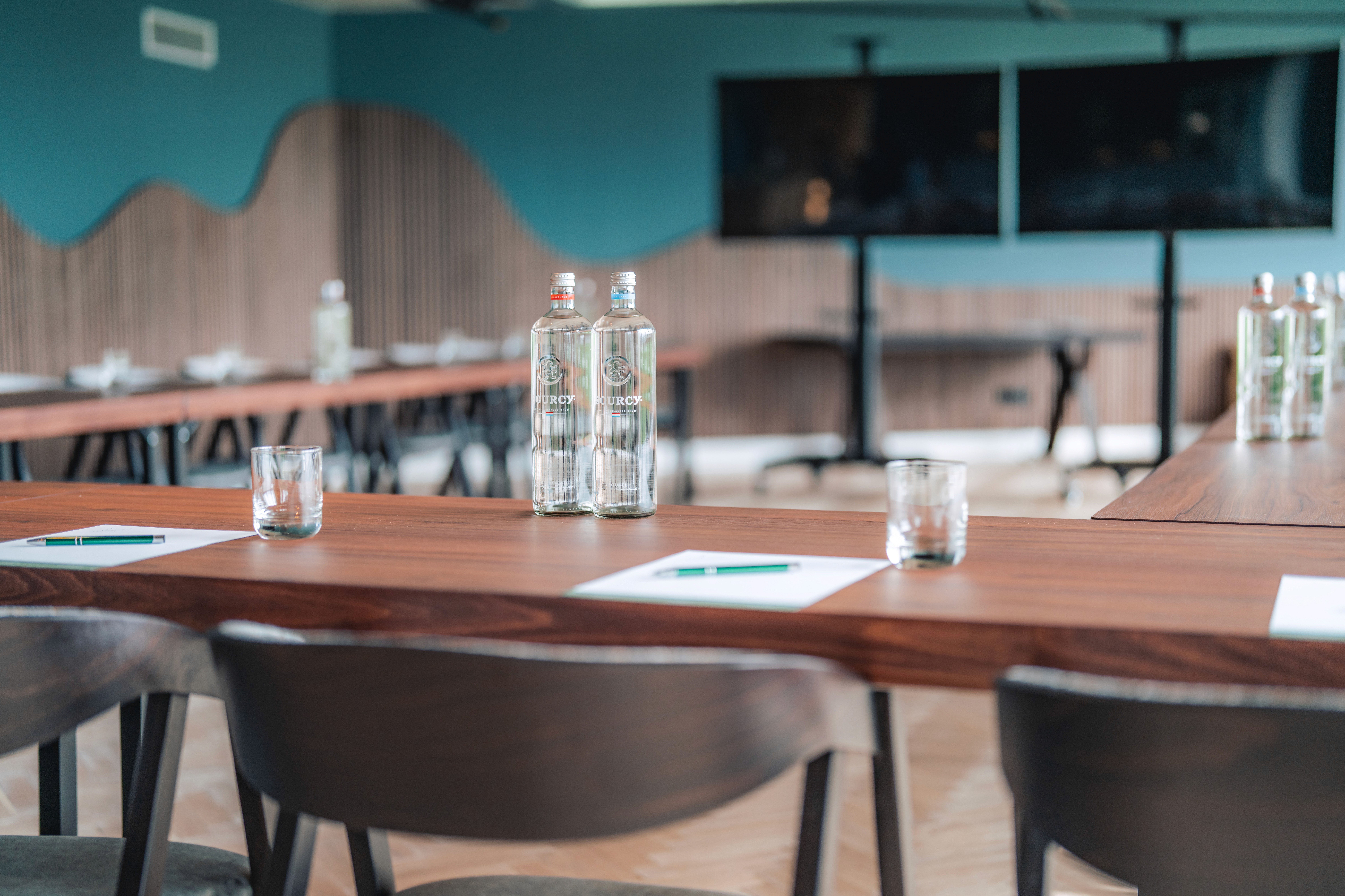 art deco styled bedroom with accsent mirror above the bed