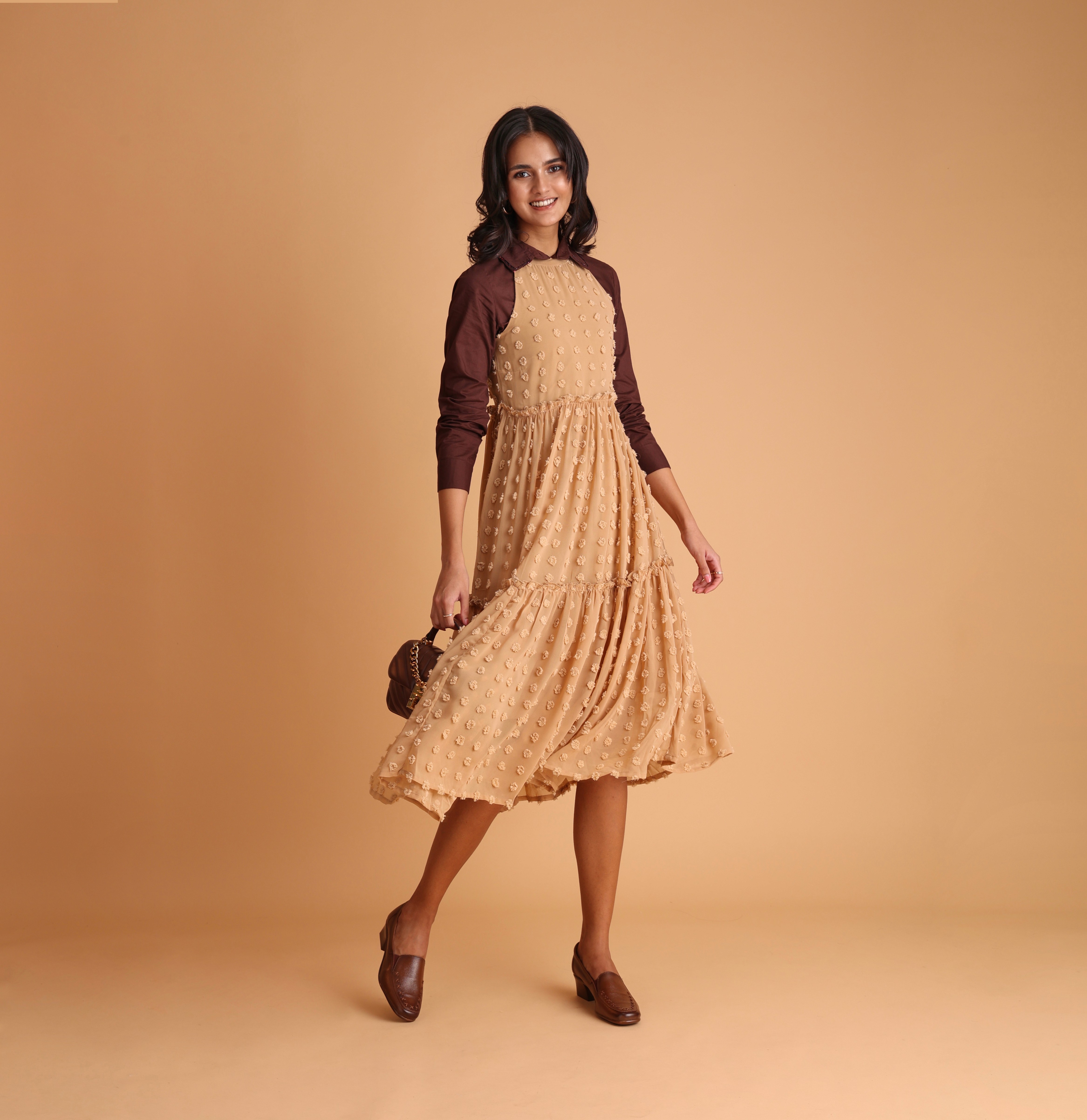 Friends laughing and posing inside a car