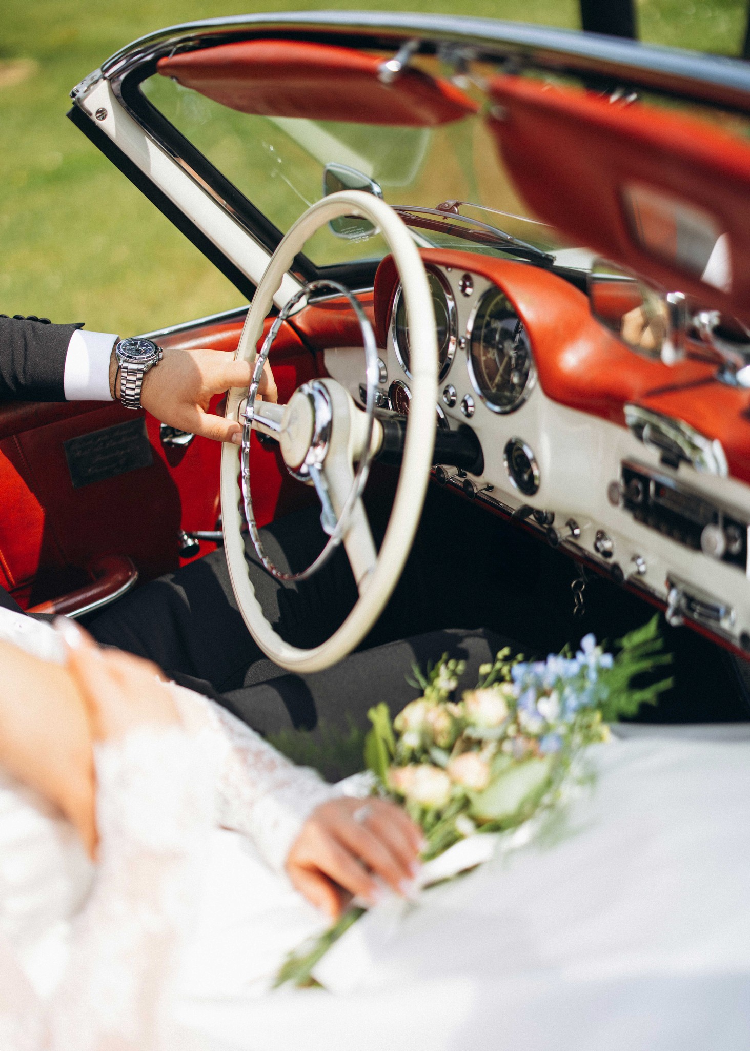 couple posing with flowers