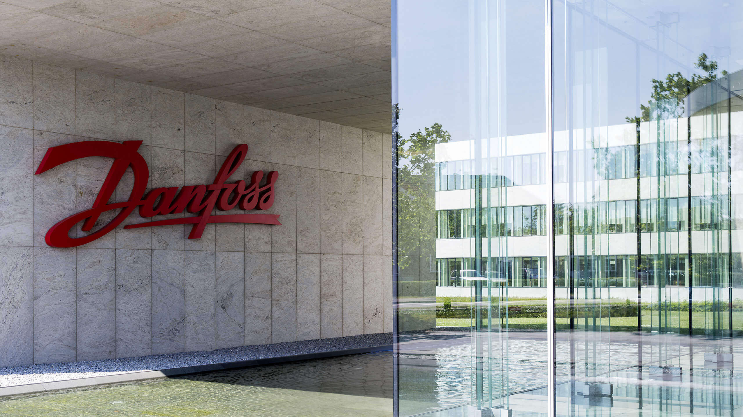 Wall mounted Danfoss logo at entrance