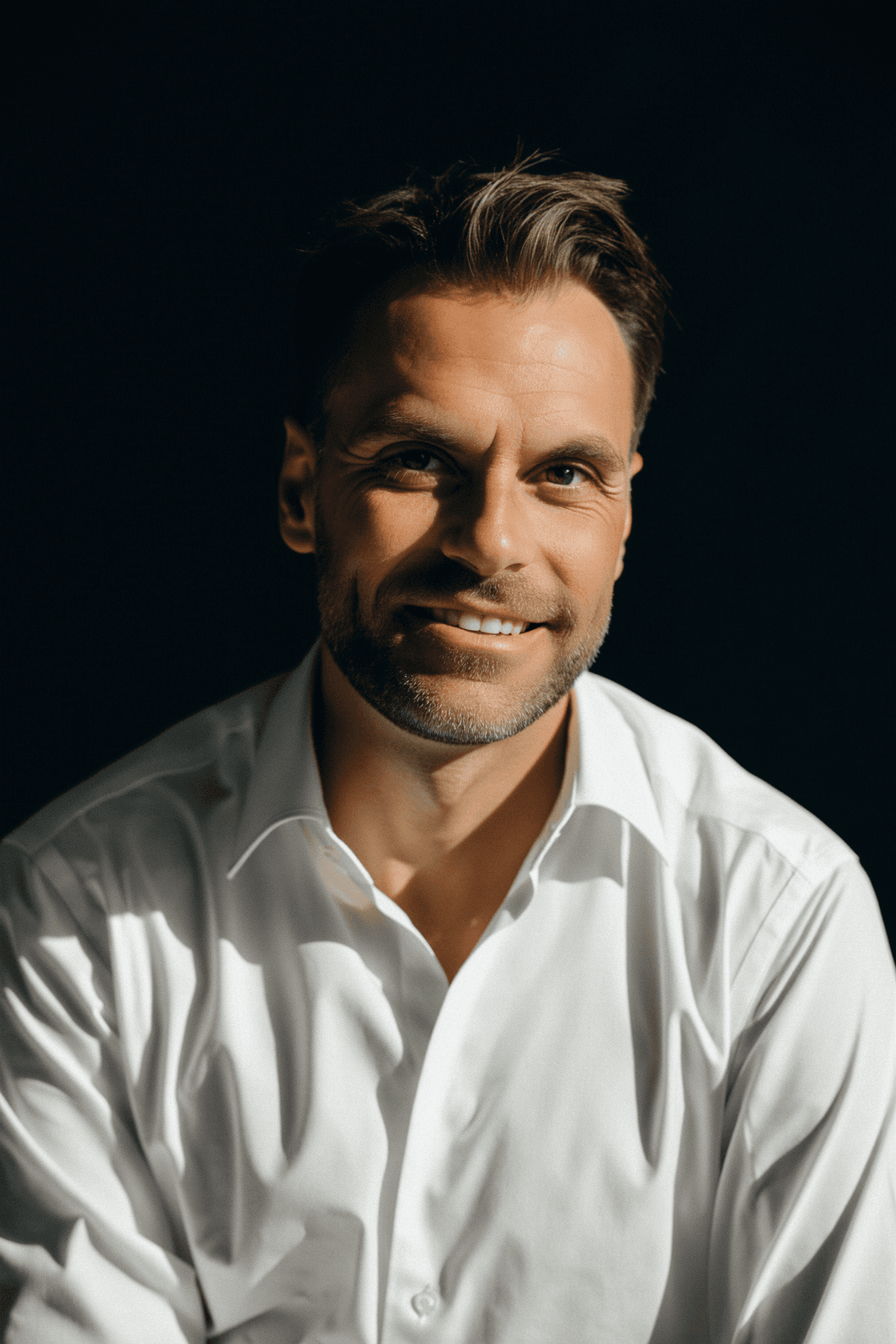 a blurry photo of a person standing in front of a wall