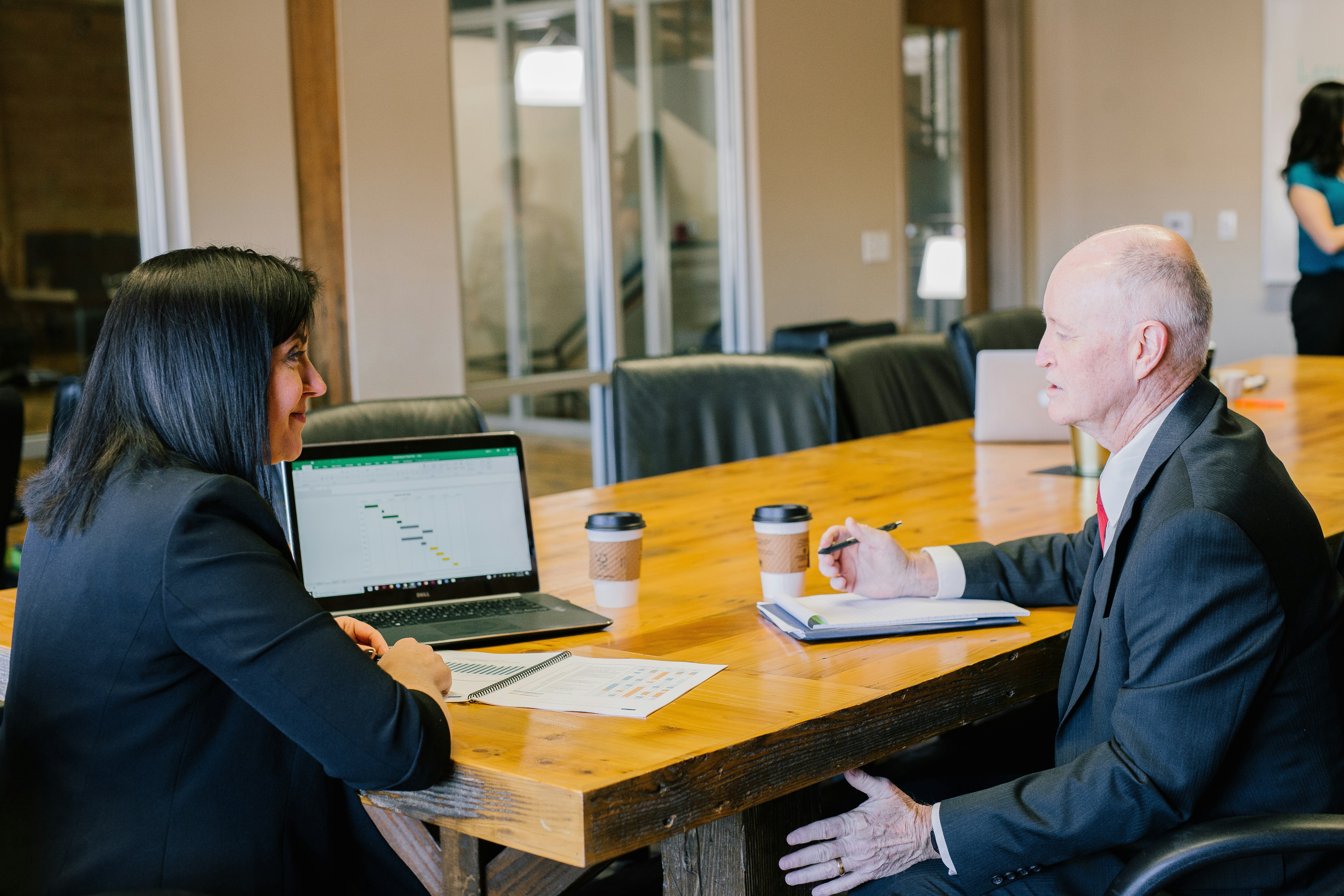 woman showing spreadsheet to owner - Google Sheets Tips