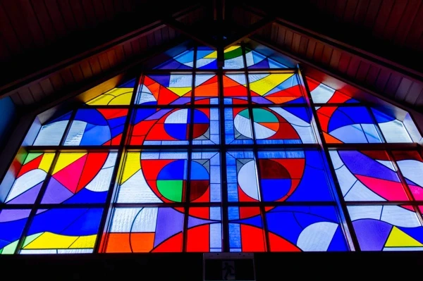 Colourful stained-glass window inside the chapel