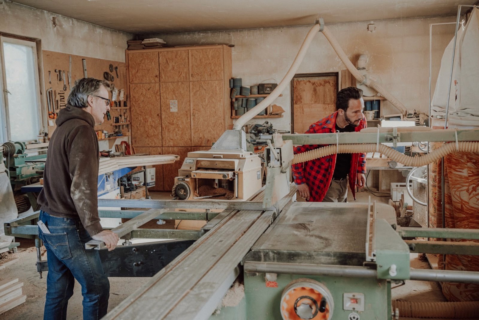 white wooden table with orange pumpkin on top