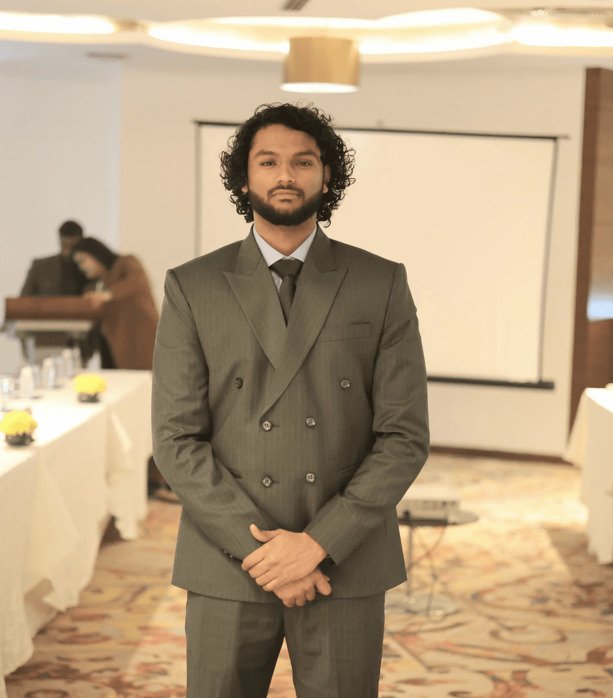 man wearing white V-neck shirt