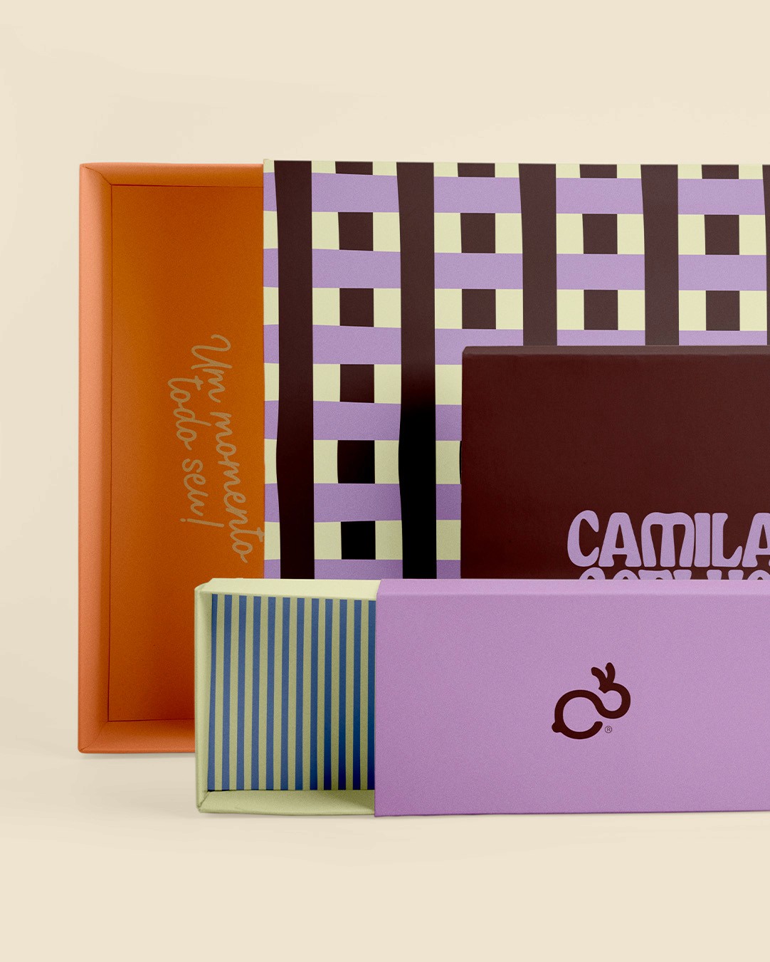 A green butterfly rests on a flower.