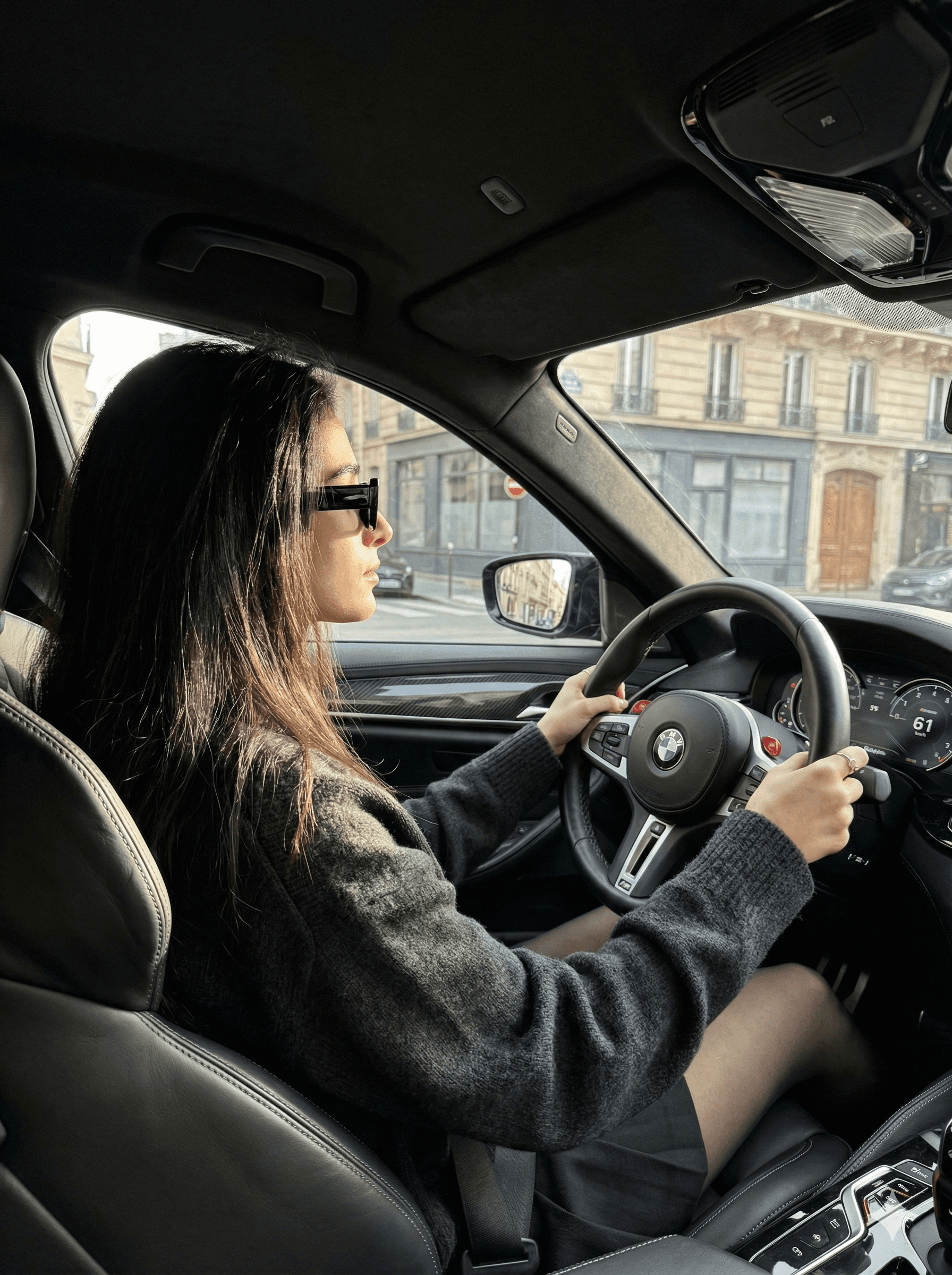 Ira driving her BMW m5