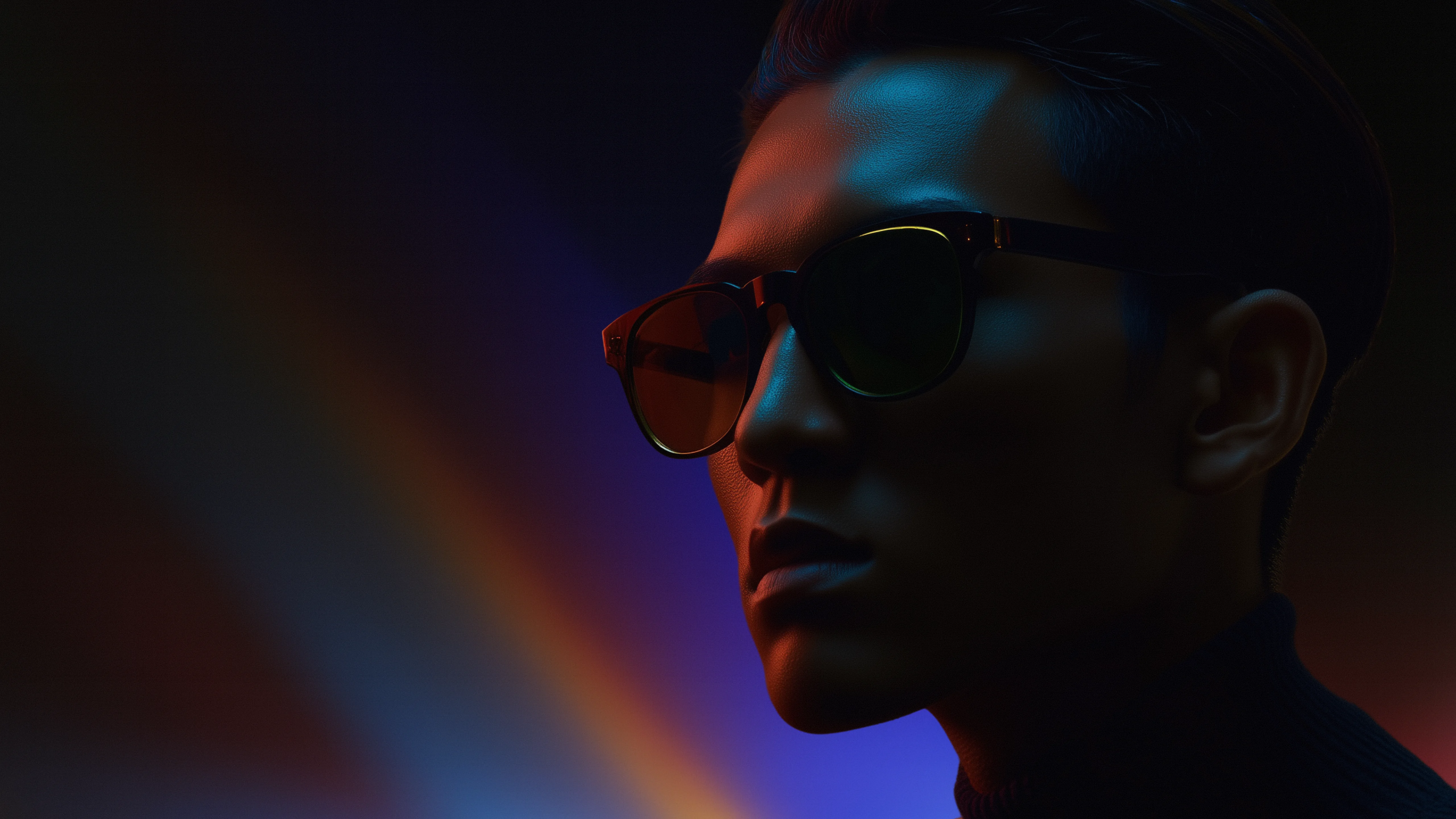 Man wearing sunglasses and a black turtleneck standing under colorful dramatic lighting, used as hero image for design website
