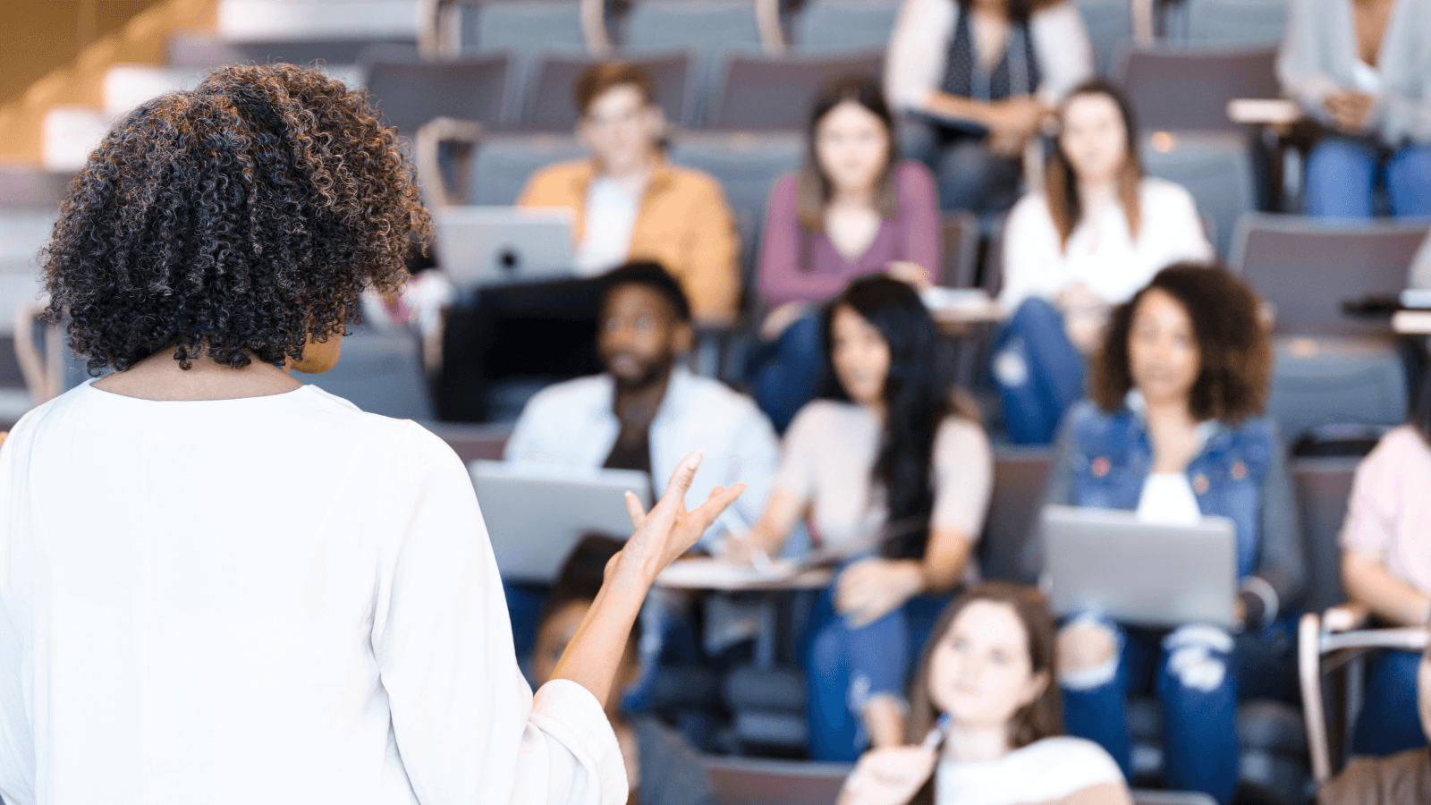 teacher speaking to students