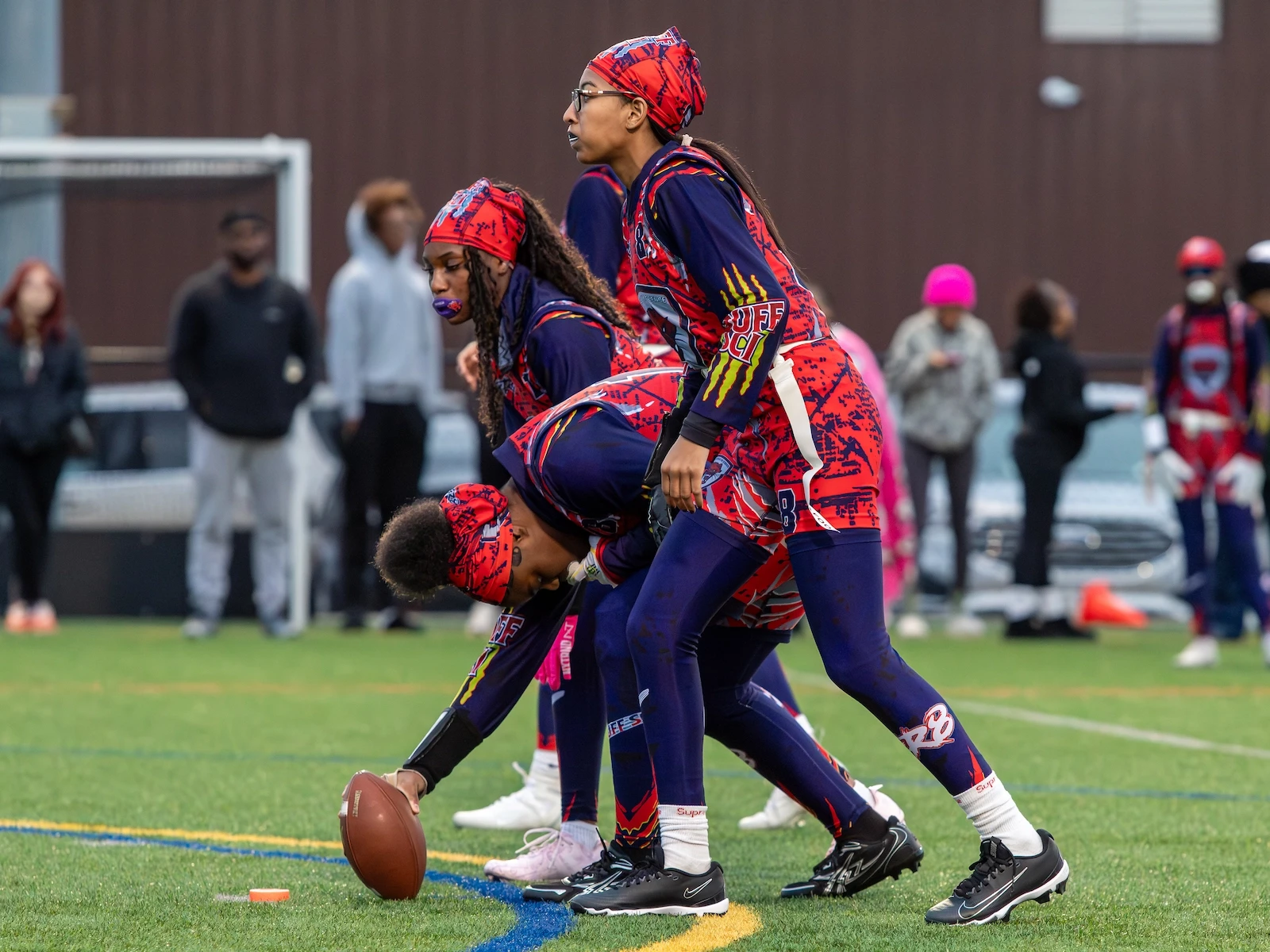 BuffSci high school students playing basketball during athletics program