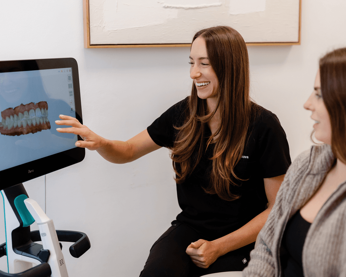 Dr Bistra Trpkova explaining dental health to a patient at Surry Hills Dental Centre