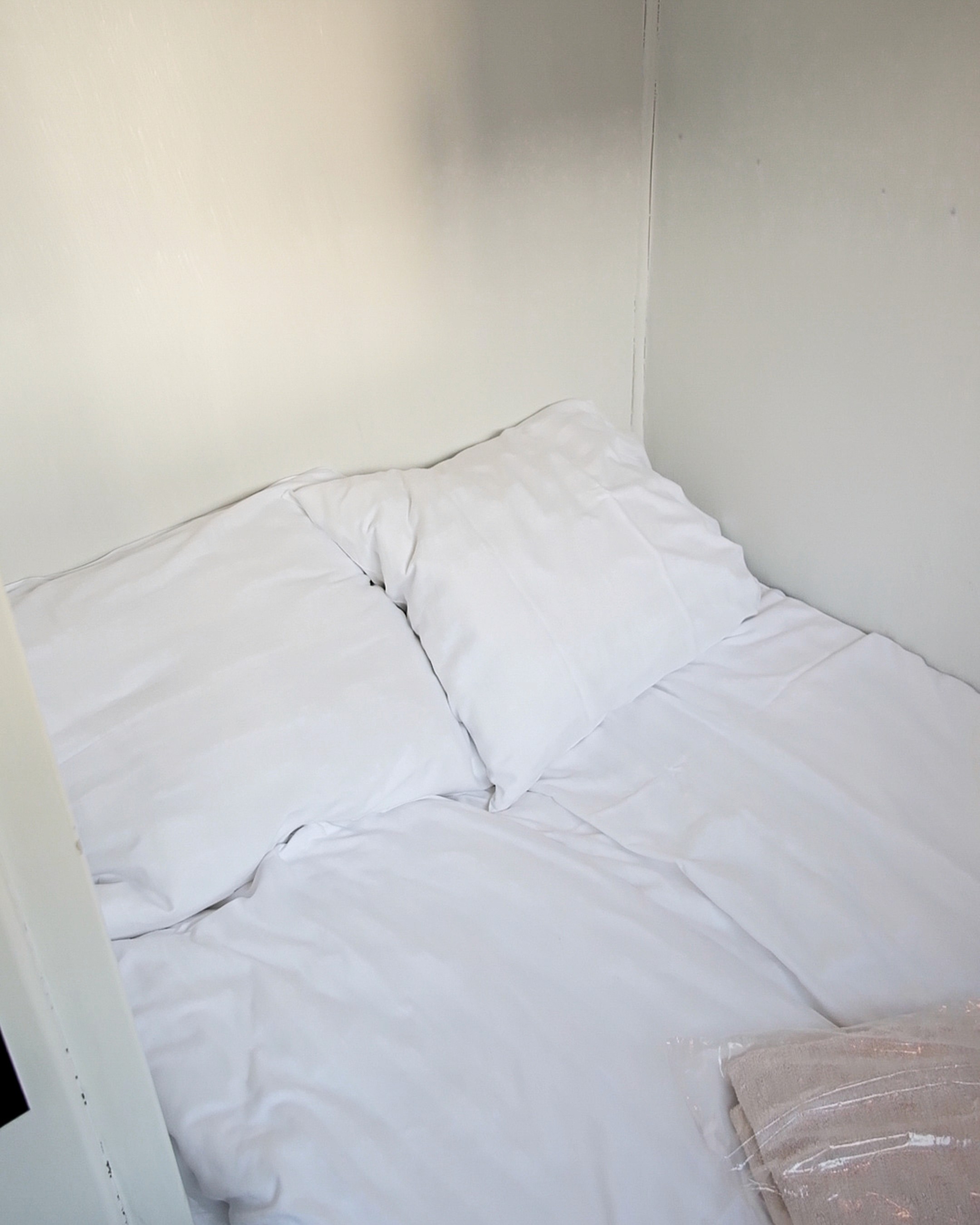 Modern office desk with angular design and leather chair