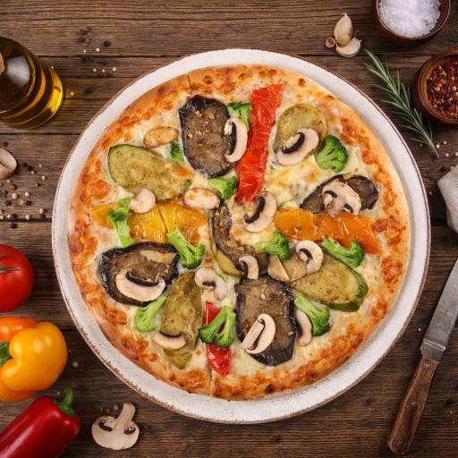 pizza with green leaf vegetable