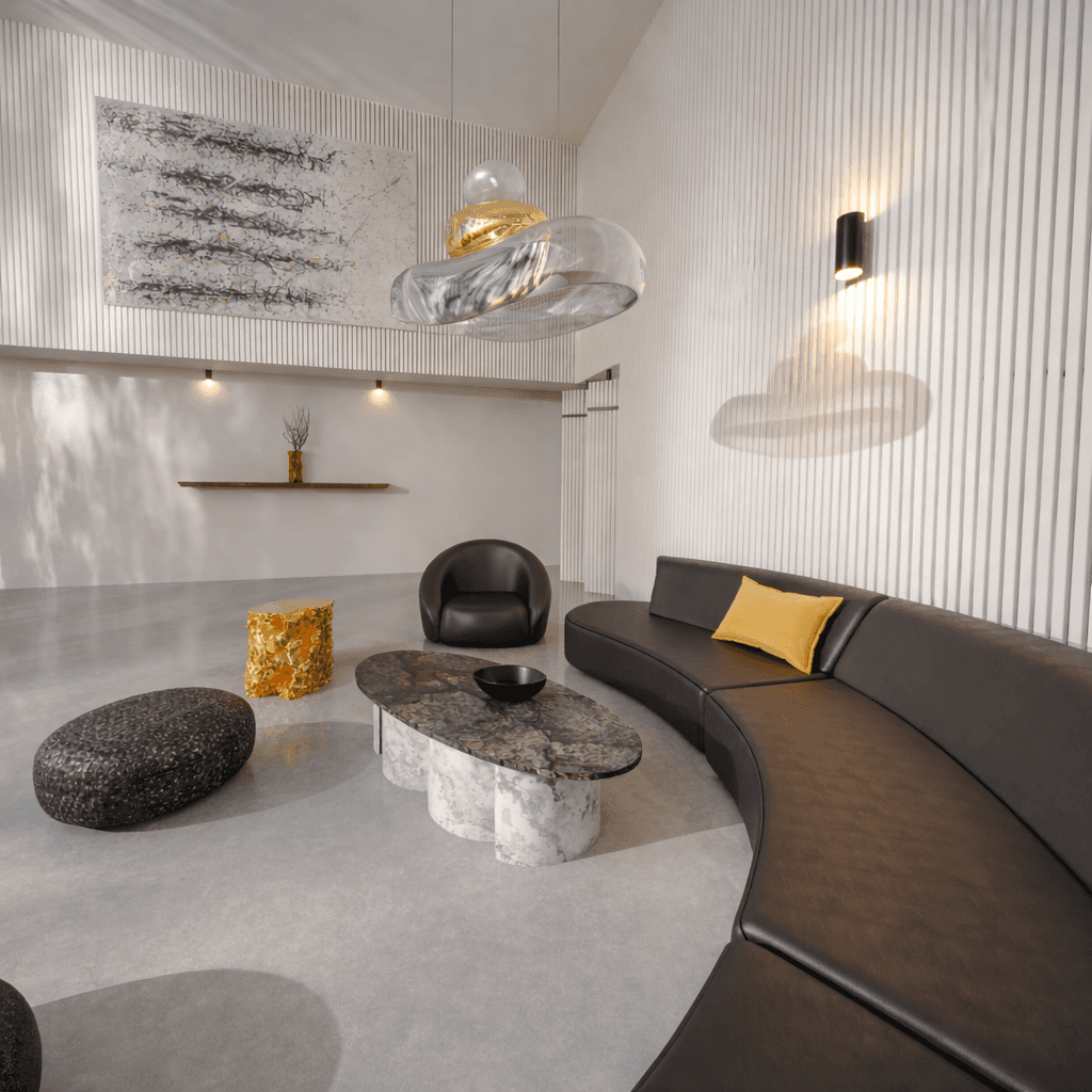 Contemporary luxury interior with statement glass chandelier and minimalist marble coffee table