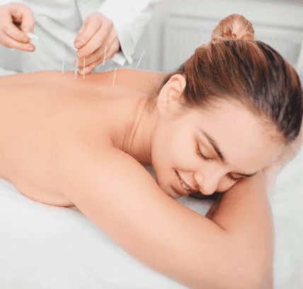 Woman applying skincare on her face