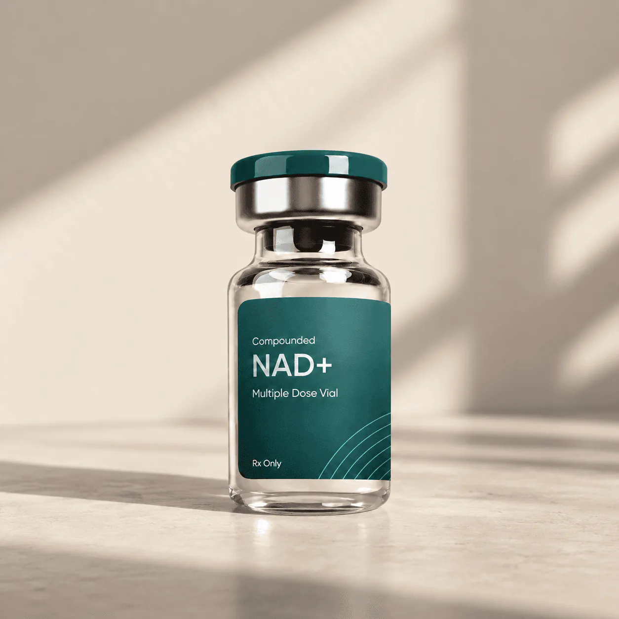 Vial labelled Compounded NAD+, Multiple Dose Vial, Rx Only, in soft window light