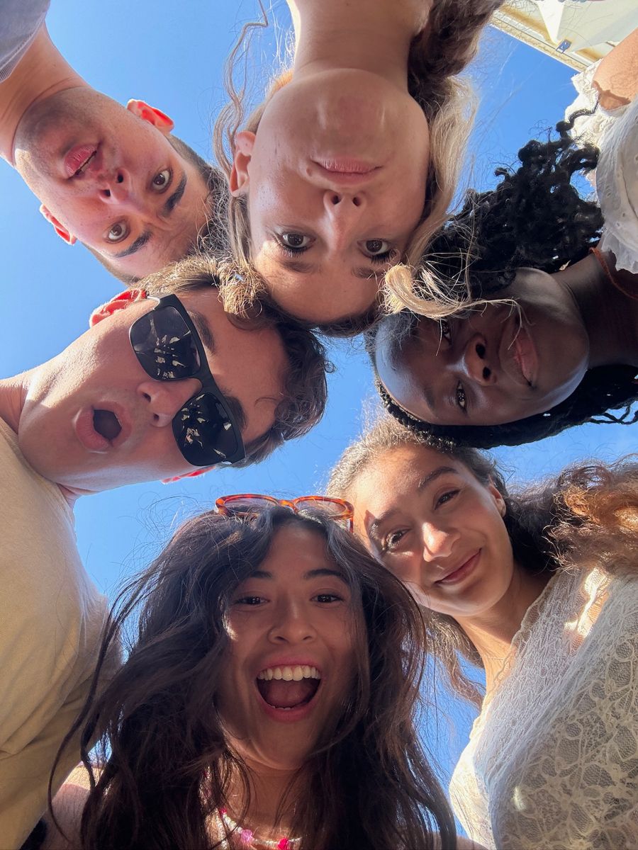woman wearing white T-shirt smiling