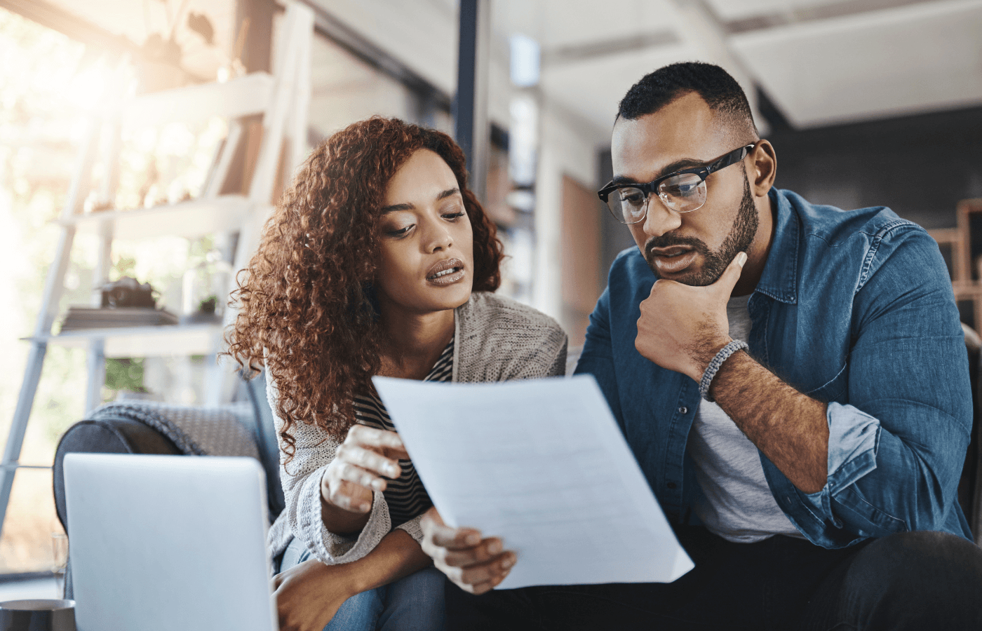 couple looking over a document