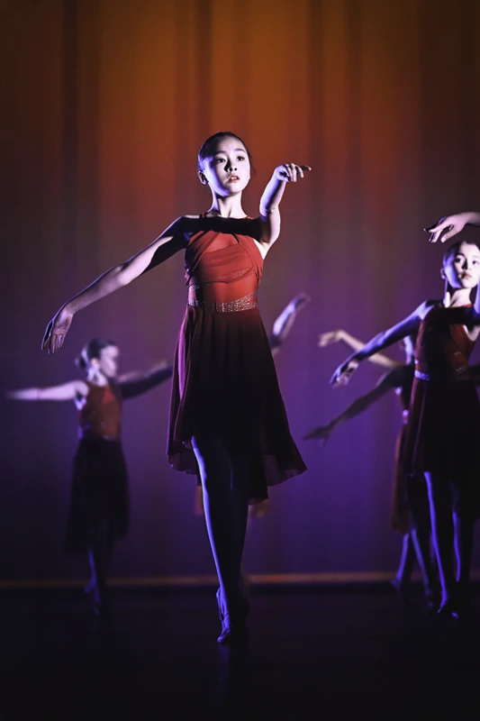 Junior lyrical dancer performing on stage at the Seymour Centre