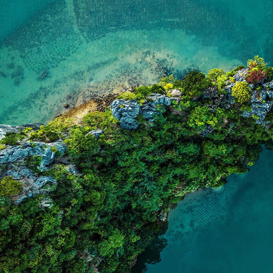 Island surrounded by water.