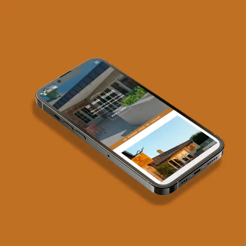 Phone mockup showing the cross guns website
